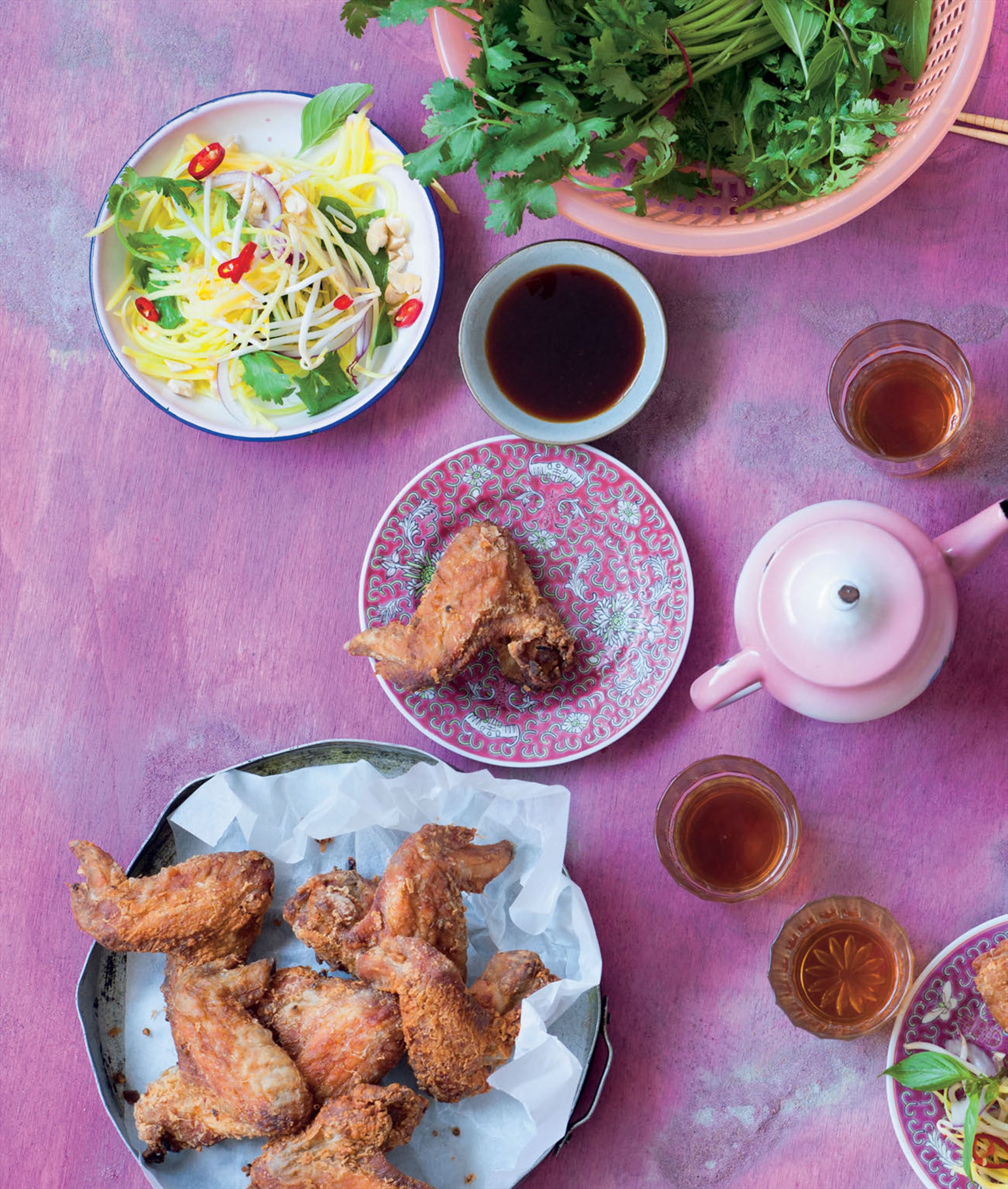 Chicken wings with green mango salad