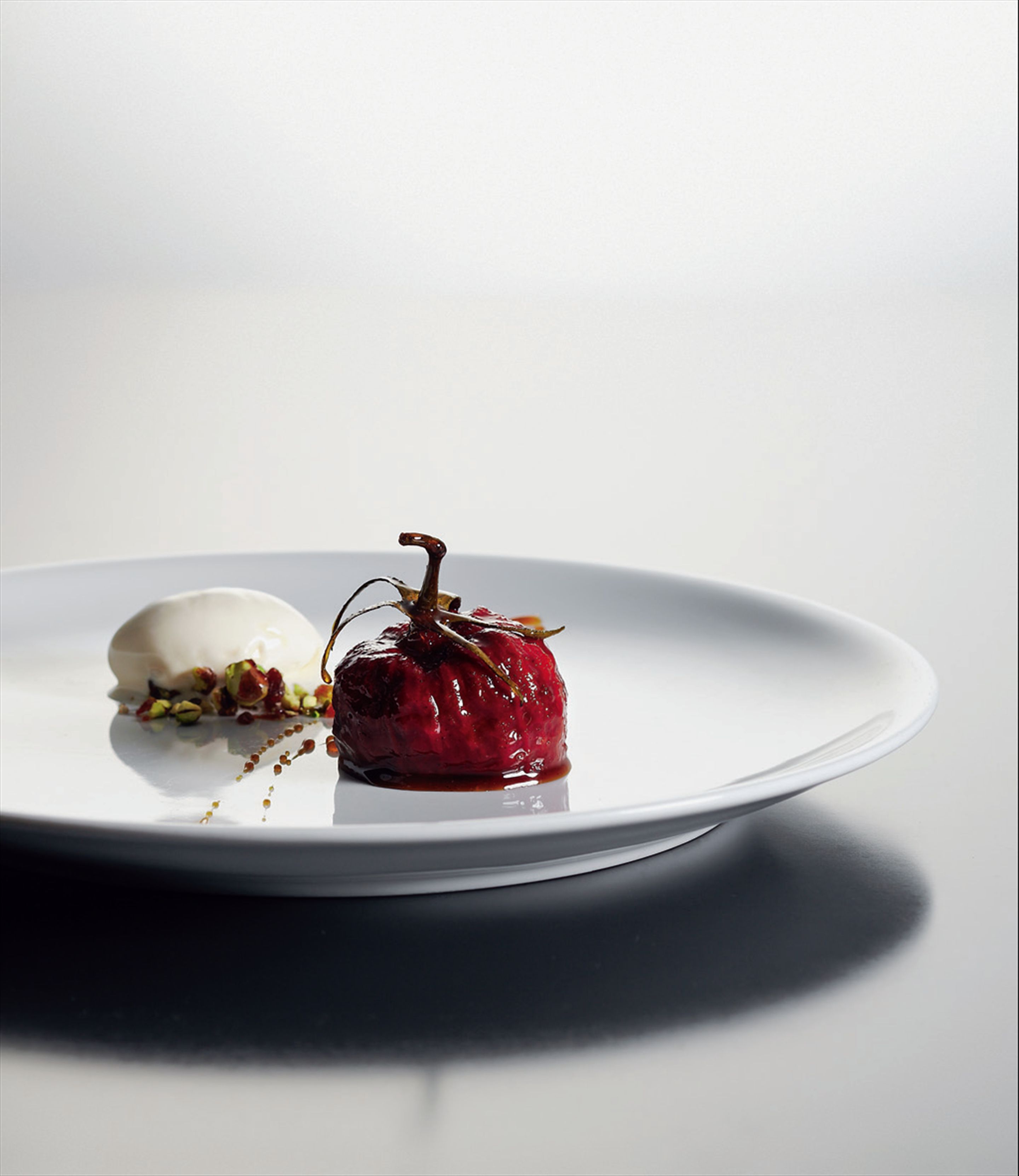 Caramelised tomato stuffed with twelve flavours and star anise ice cream