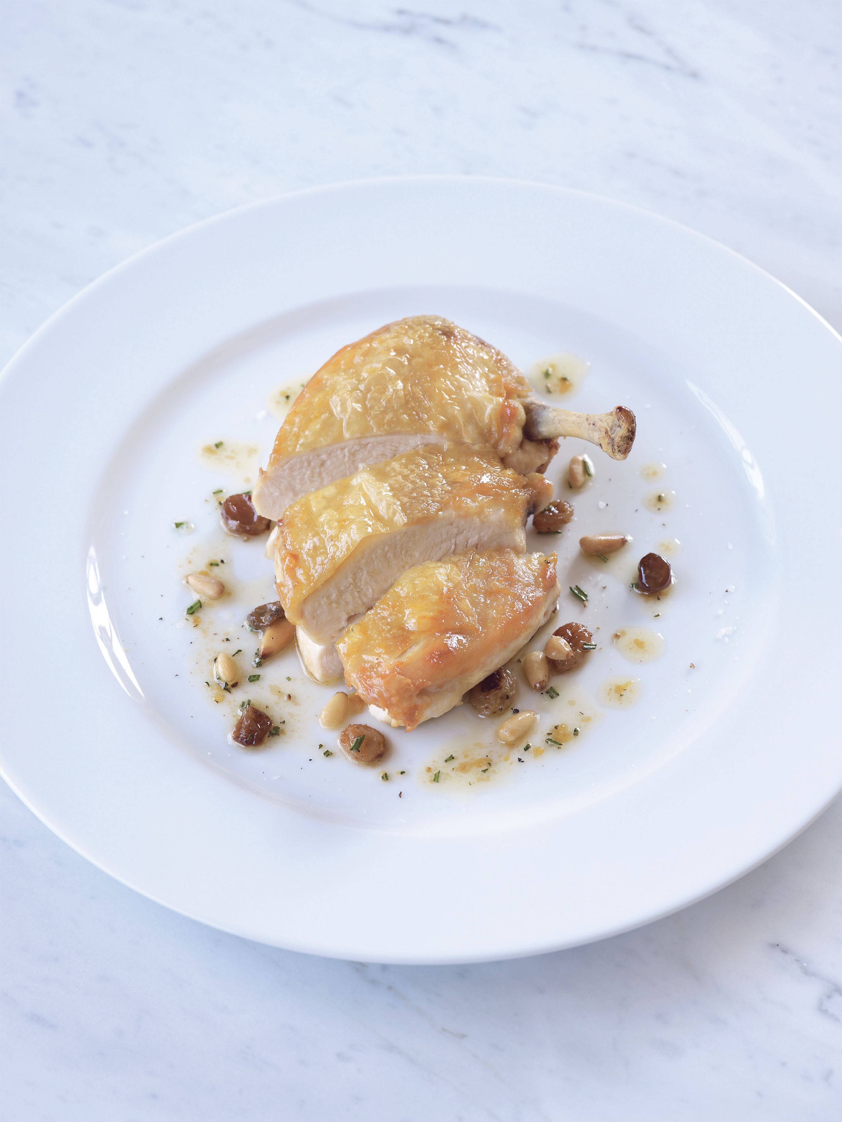 Chicken breasts with rosemary, lemon and pine nuts