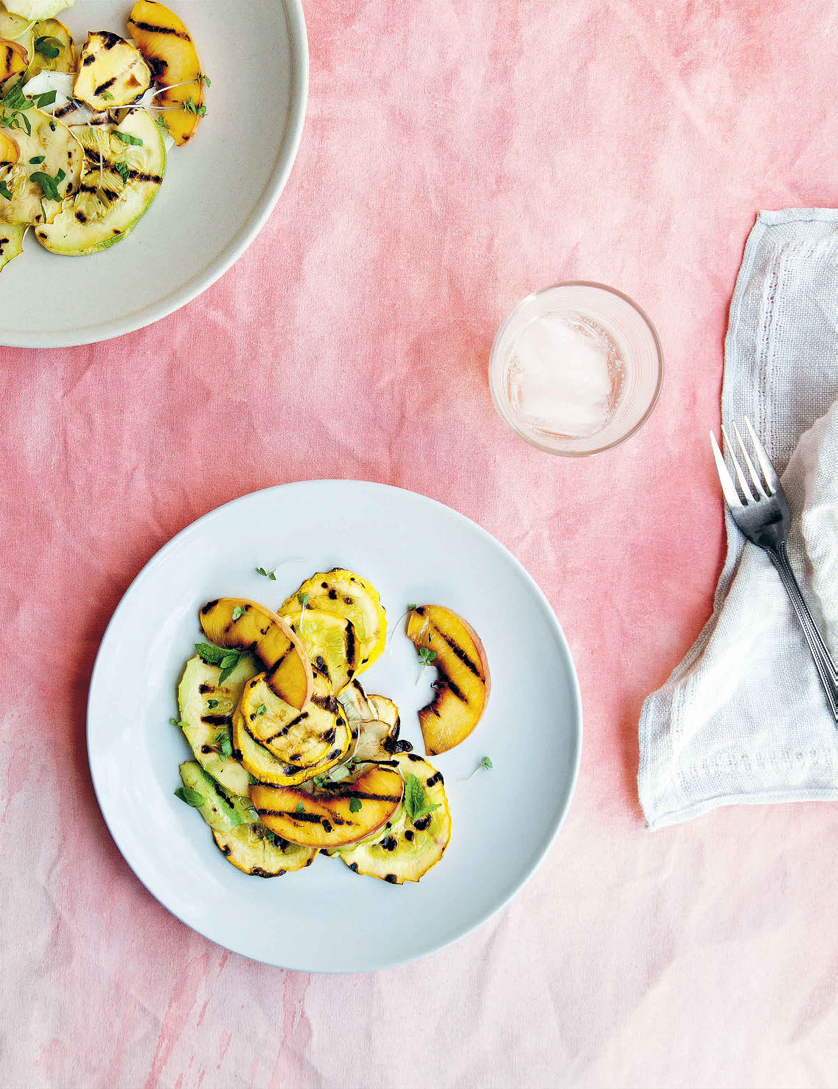 Grilled squash and peach summer salad