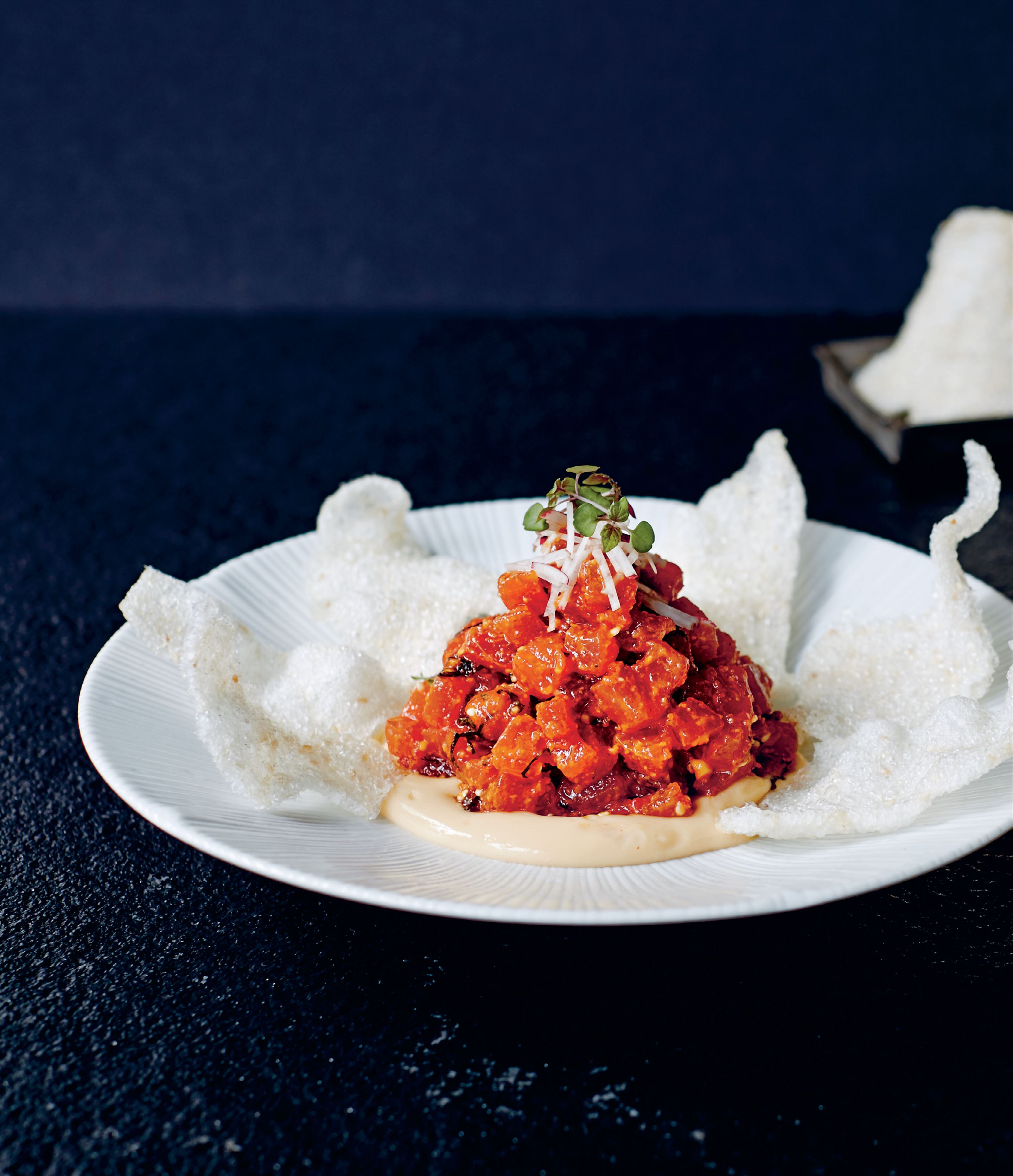 Spiced tuna tartare with shiso, yuzu custard, radish & rice crackers