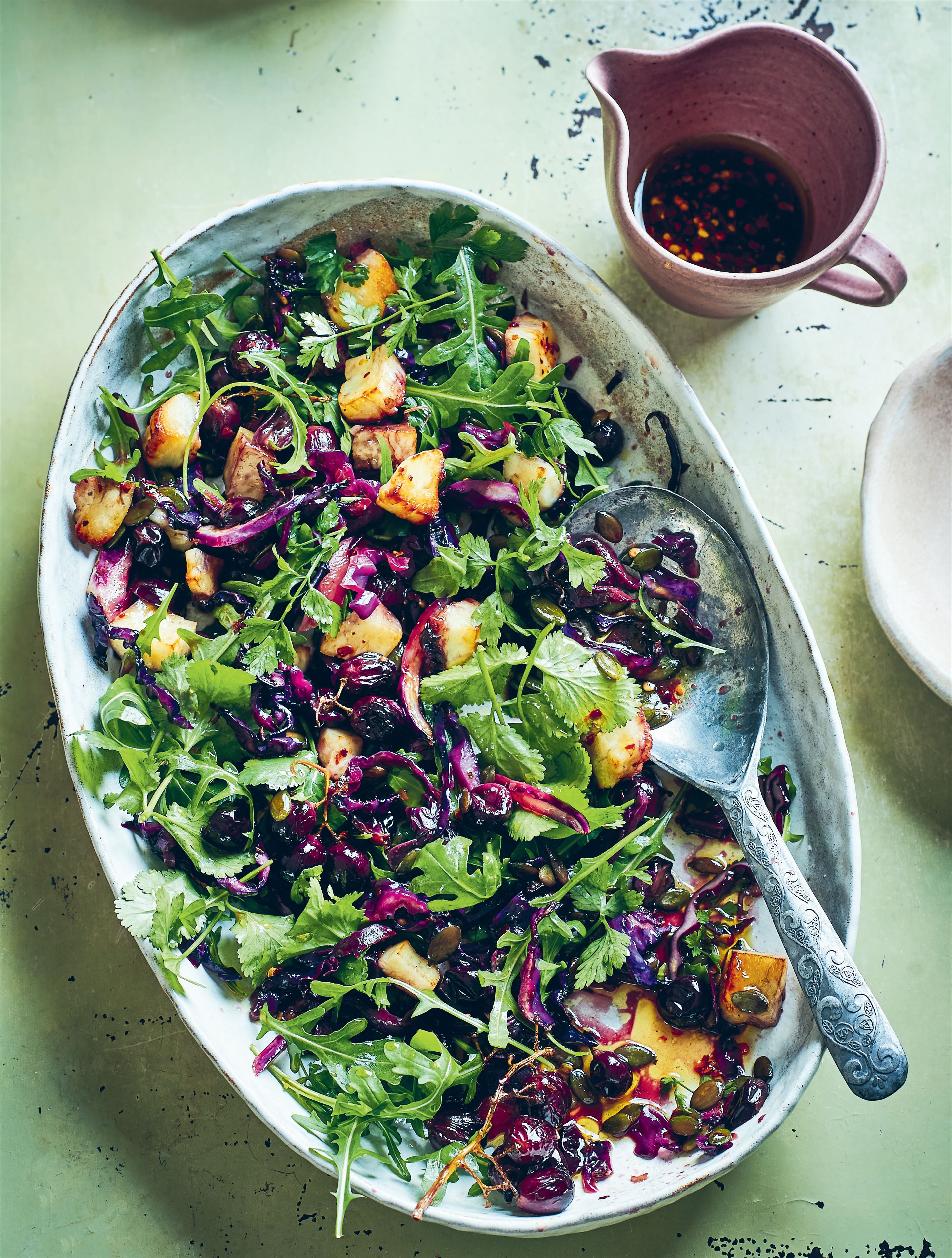 Warm salad of red cabbage, grapes and halloumi
