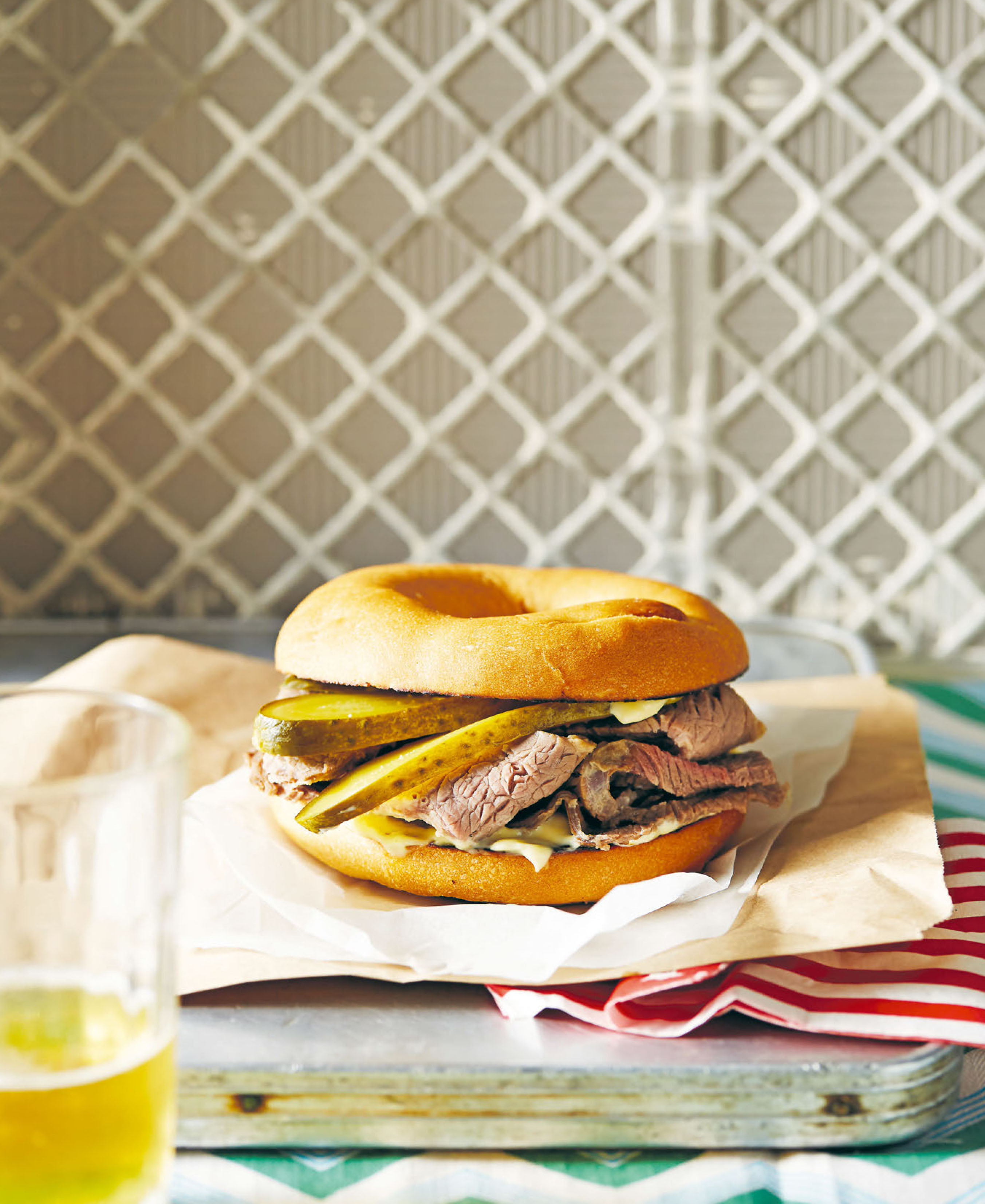 Salt beef bagel with hot English mustard and pickles