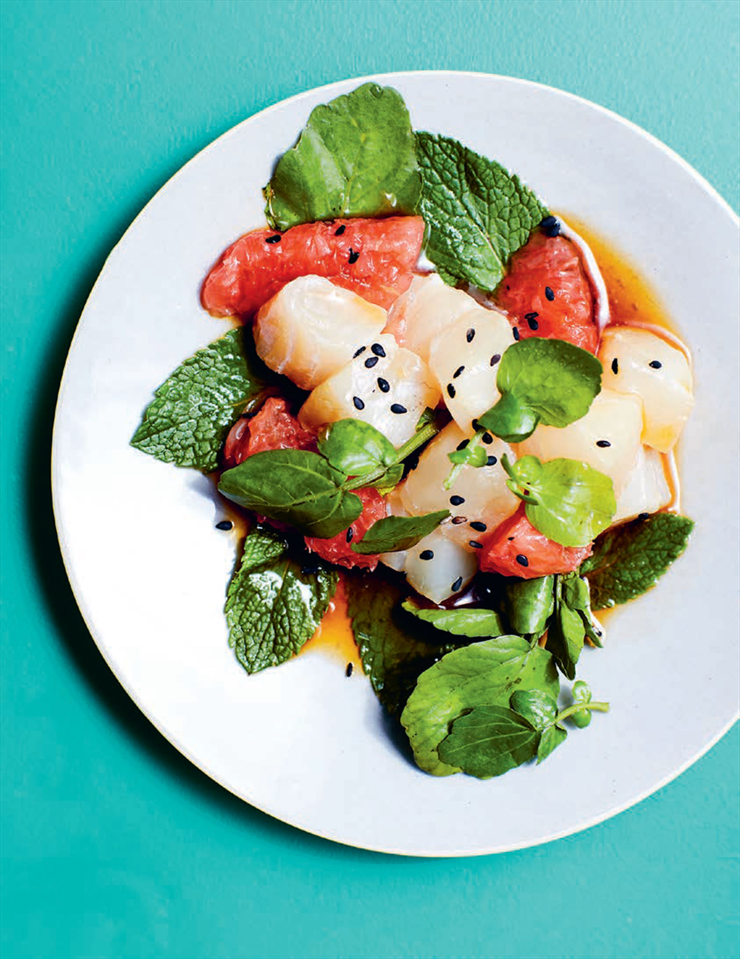 Sour sea bass with grapefruit, mint + baby watercress in a ponzu dressing