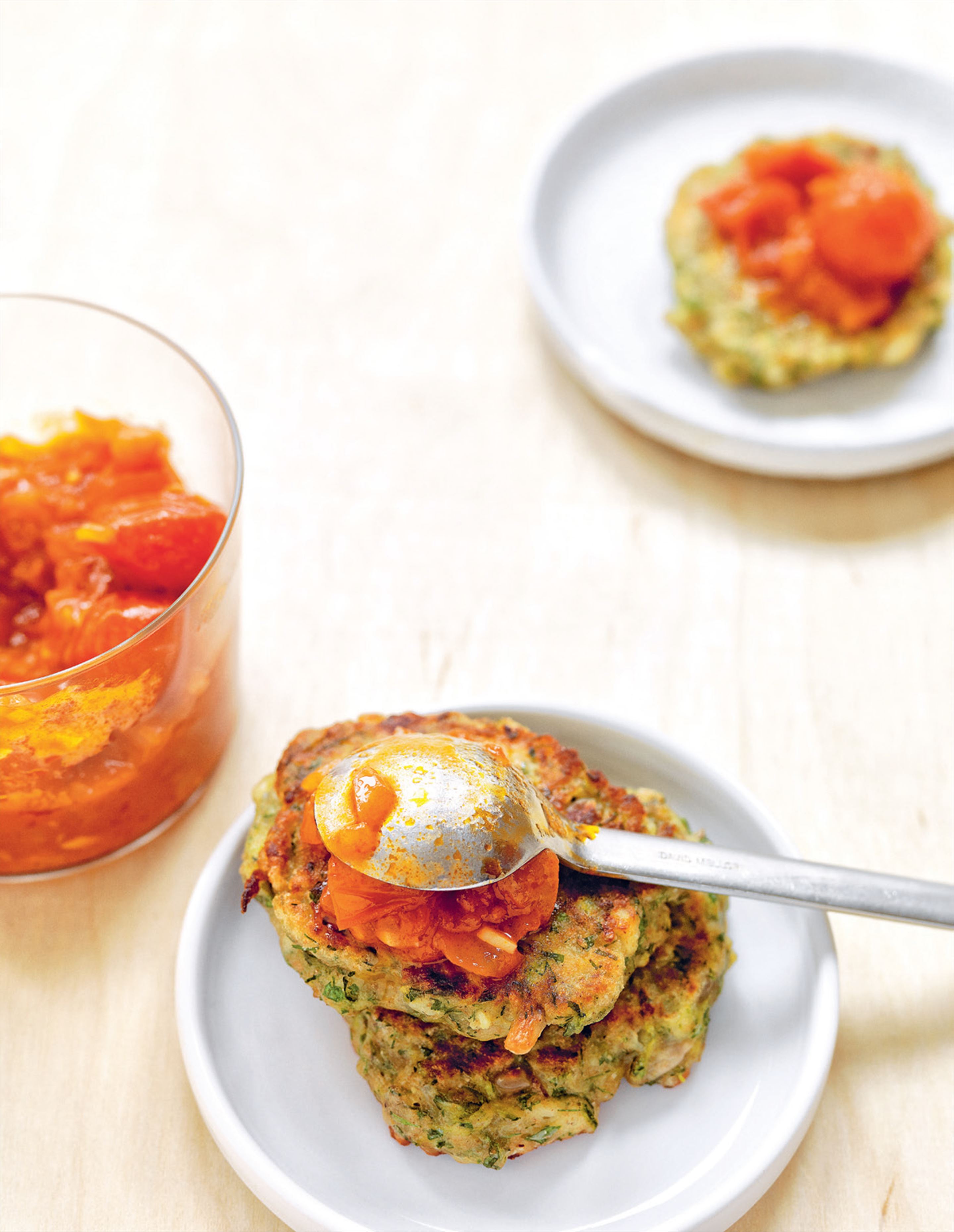 Zucchini & feta fritters with sunflower kernels & tomato sauce