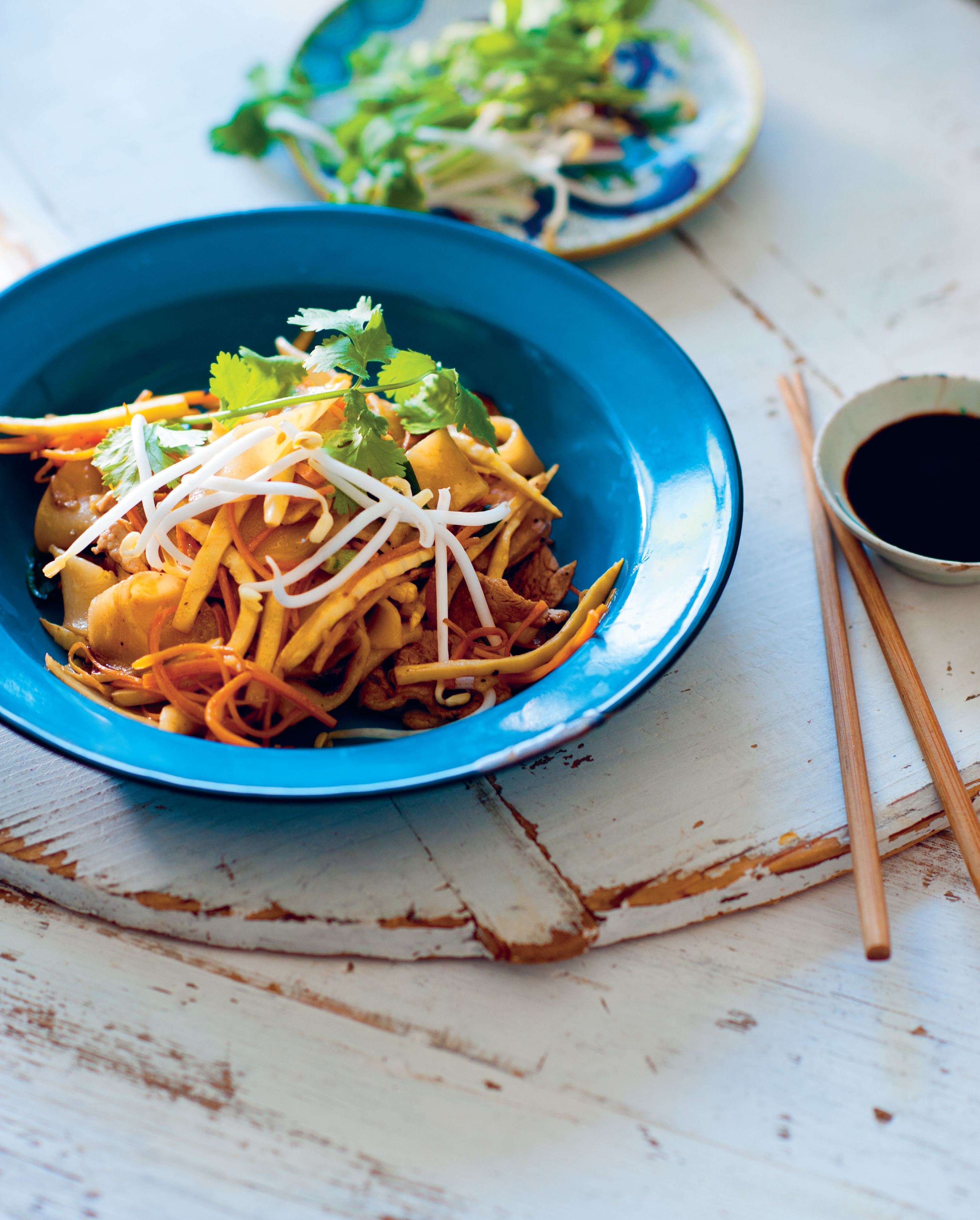 Rice noodles wok-tossed with bamboo and pork