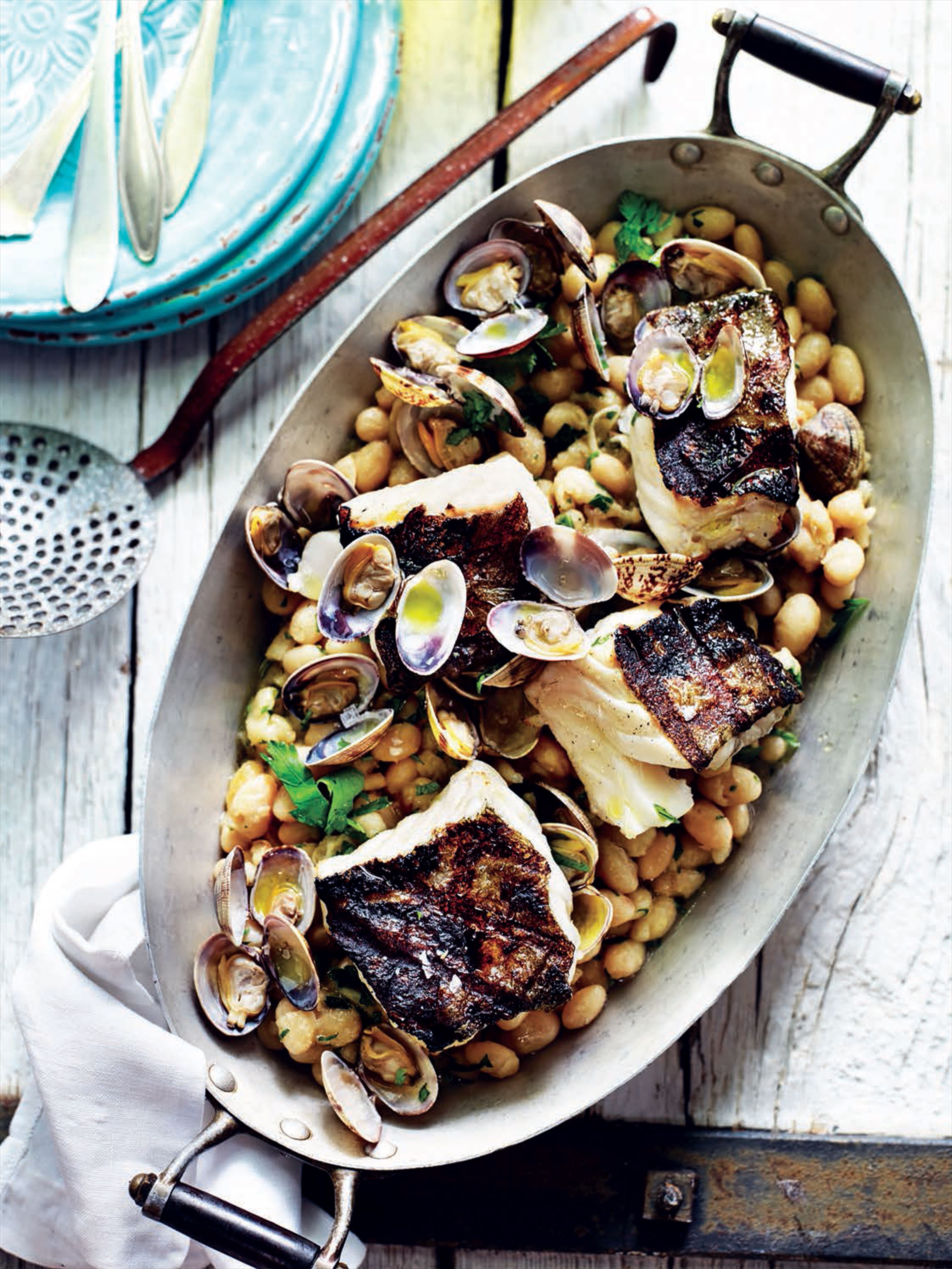 Smoked cod with white beans, clams and parsley