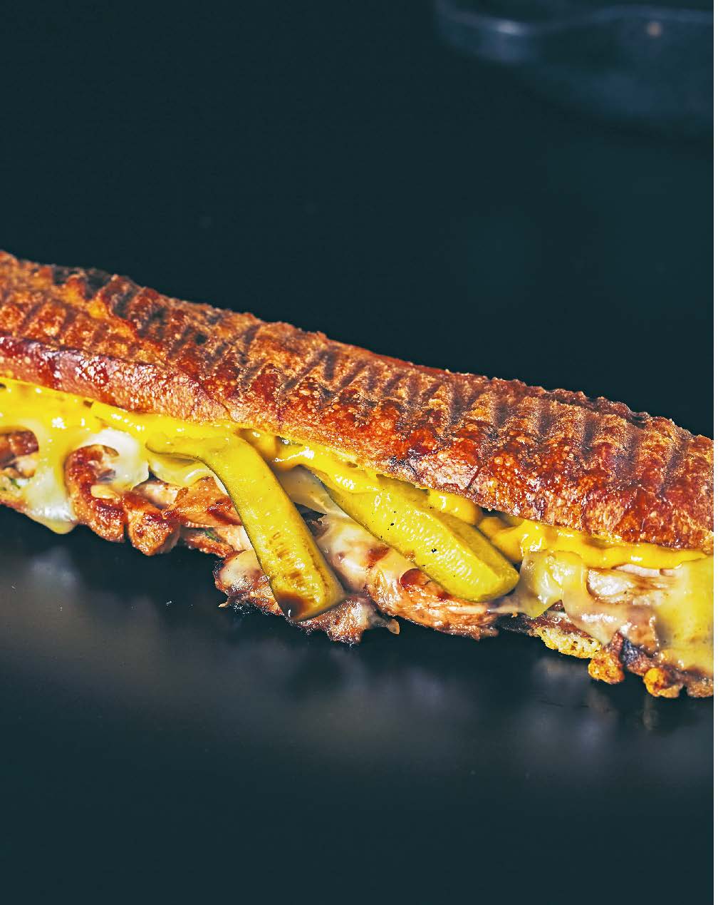Cubano: barbecued marinated pork shoulder, emmental + dill pickle