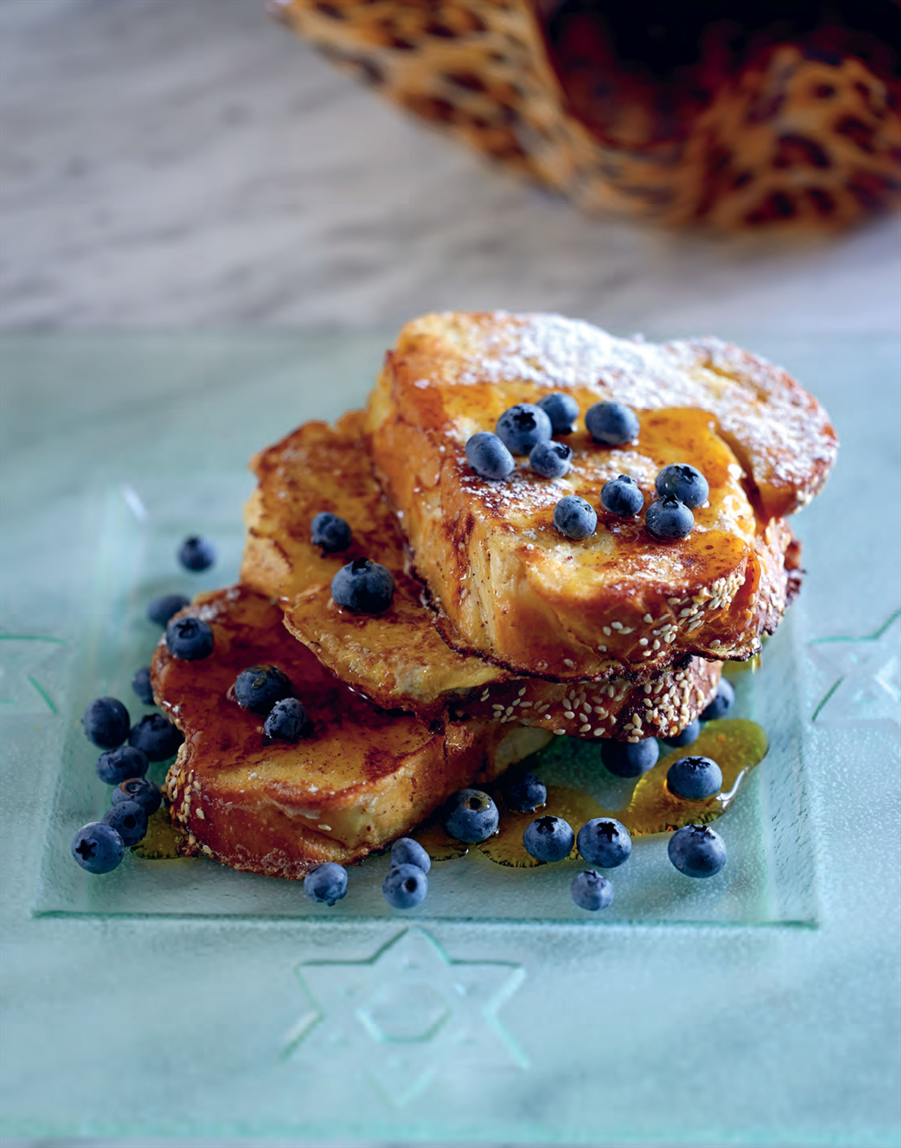 French toast challah with maple syrup and blueberries