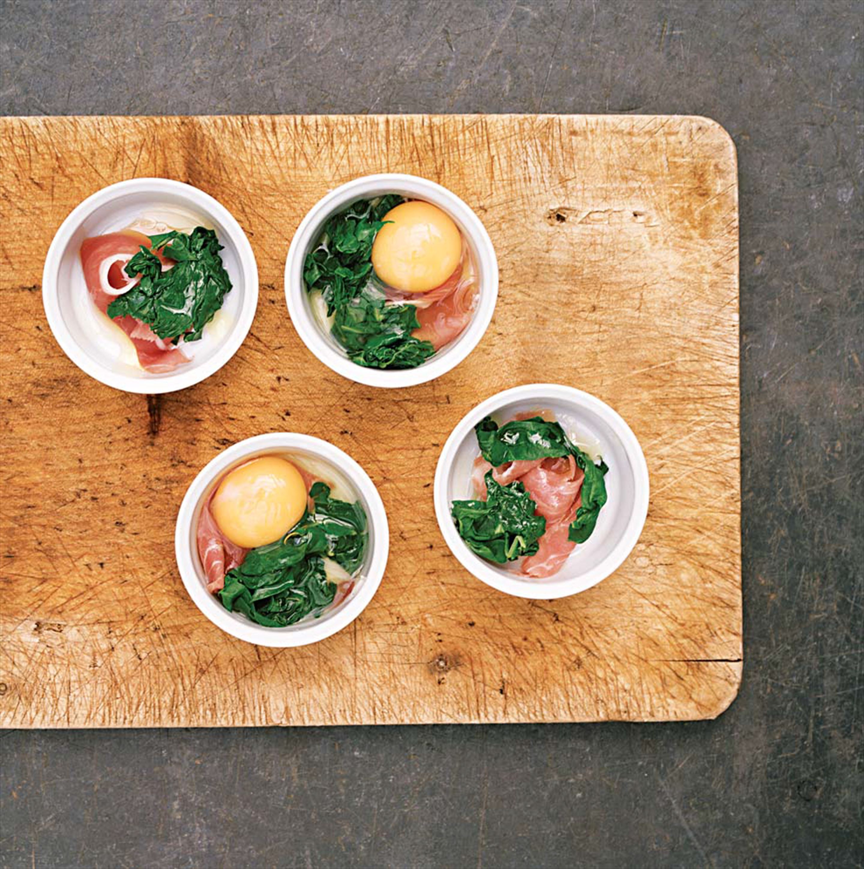 Oeufs en cocotte with spinach and parma ham