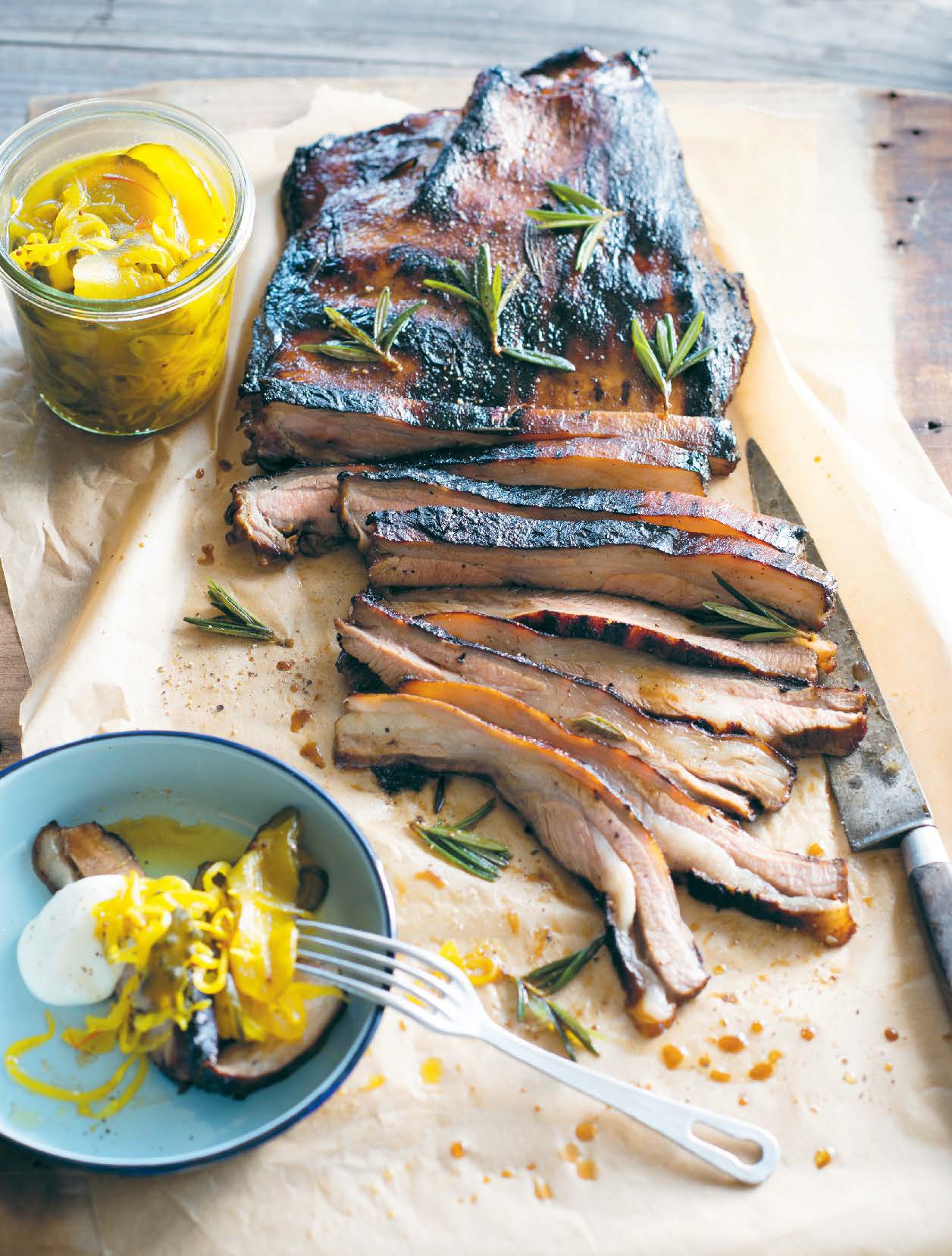 Grilled marinated lamb skirt with bread and butter cucumbers