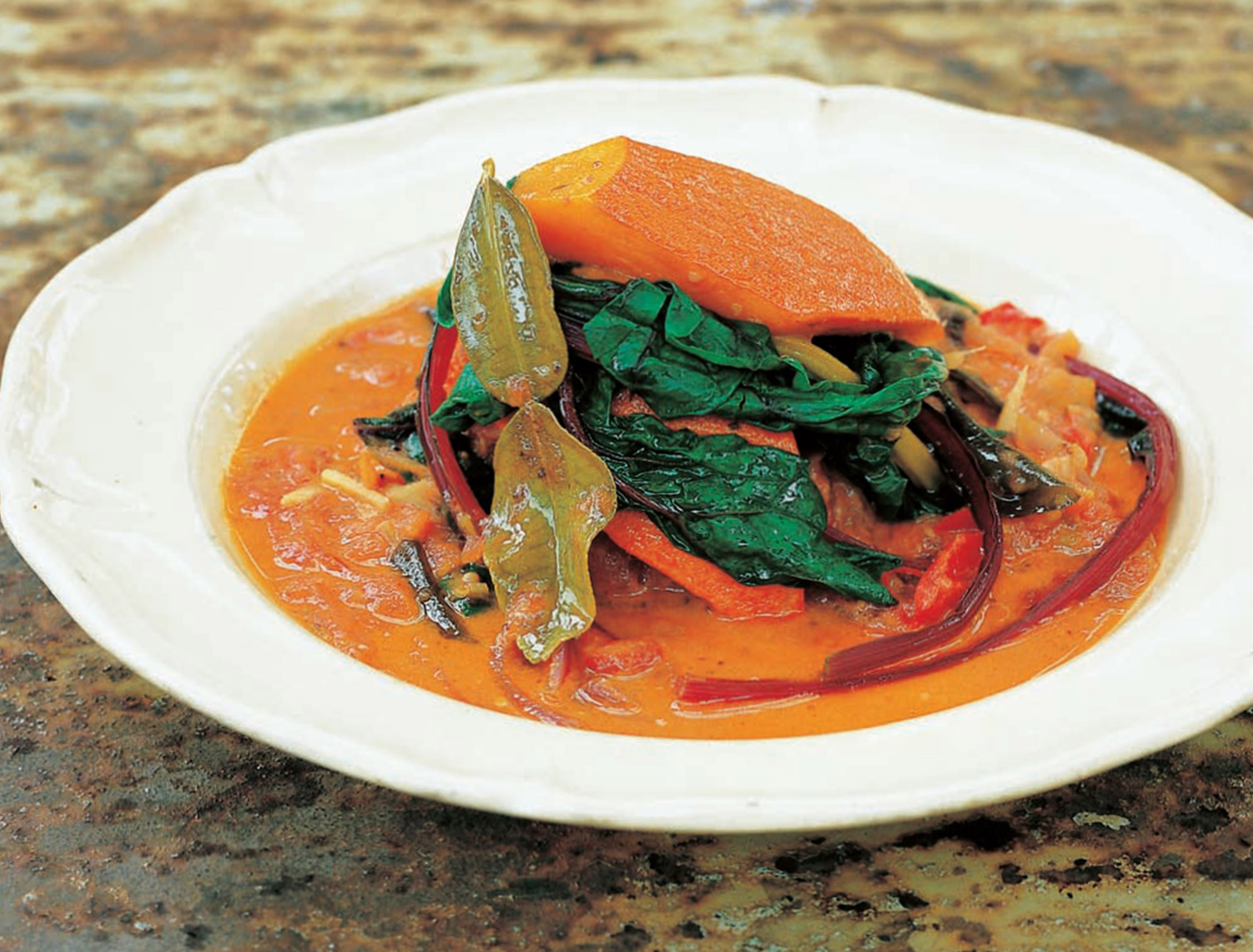 Squash and tomato curry with lime and coconut