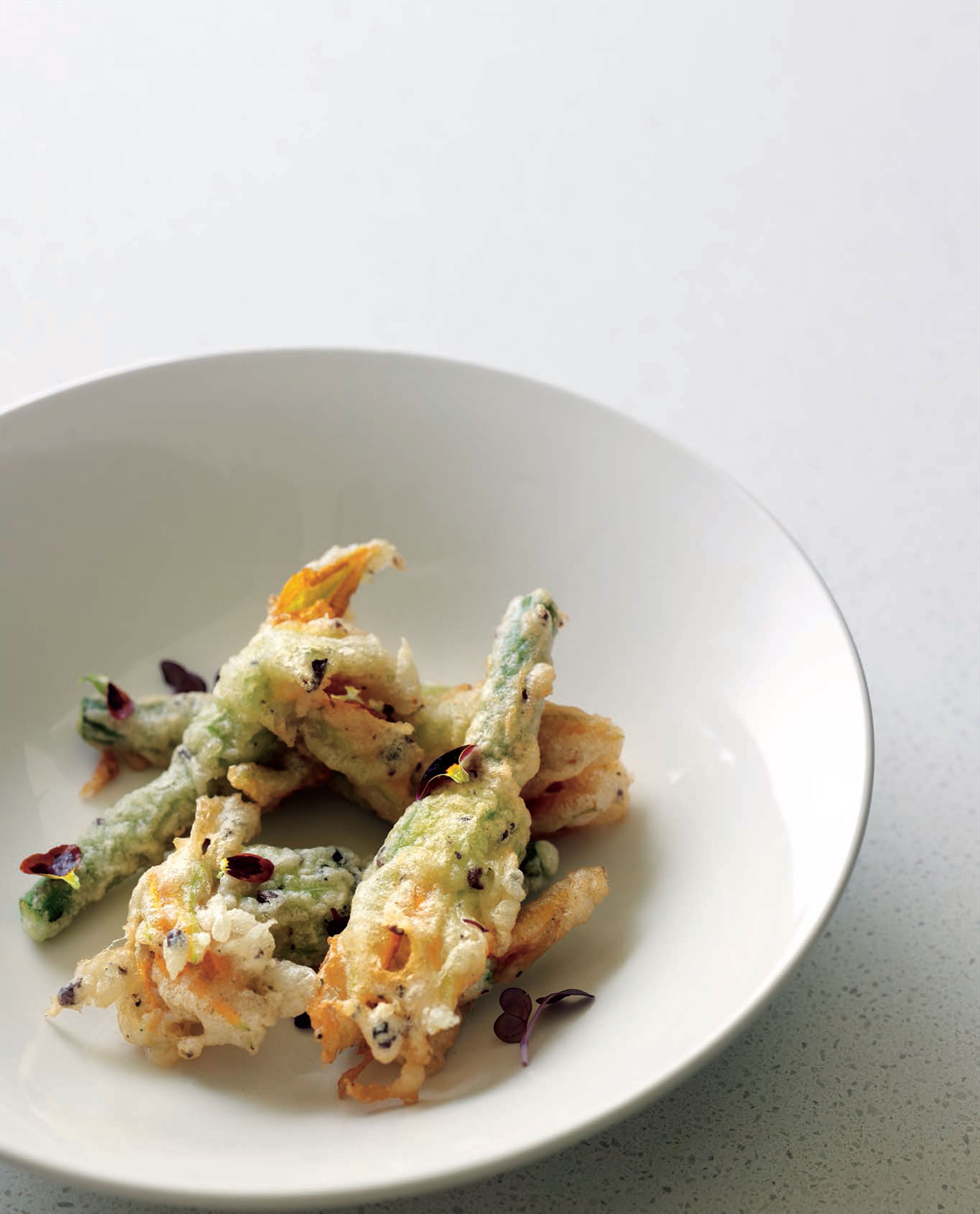 Crunchy zucchini flowers stuffed with haloumi, mint and ginger