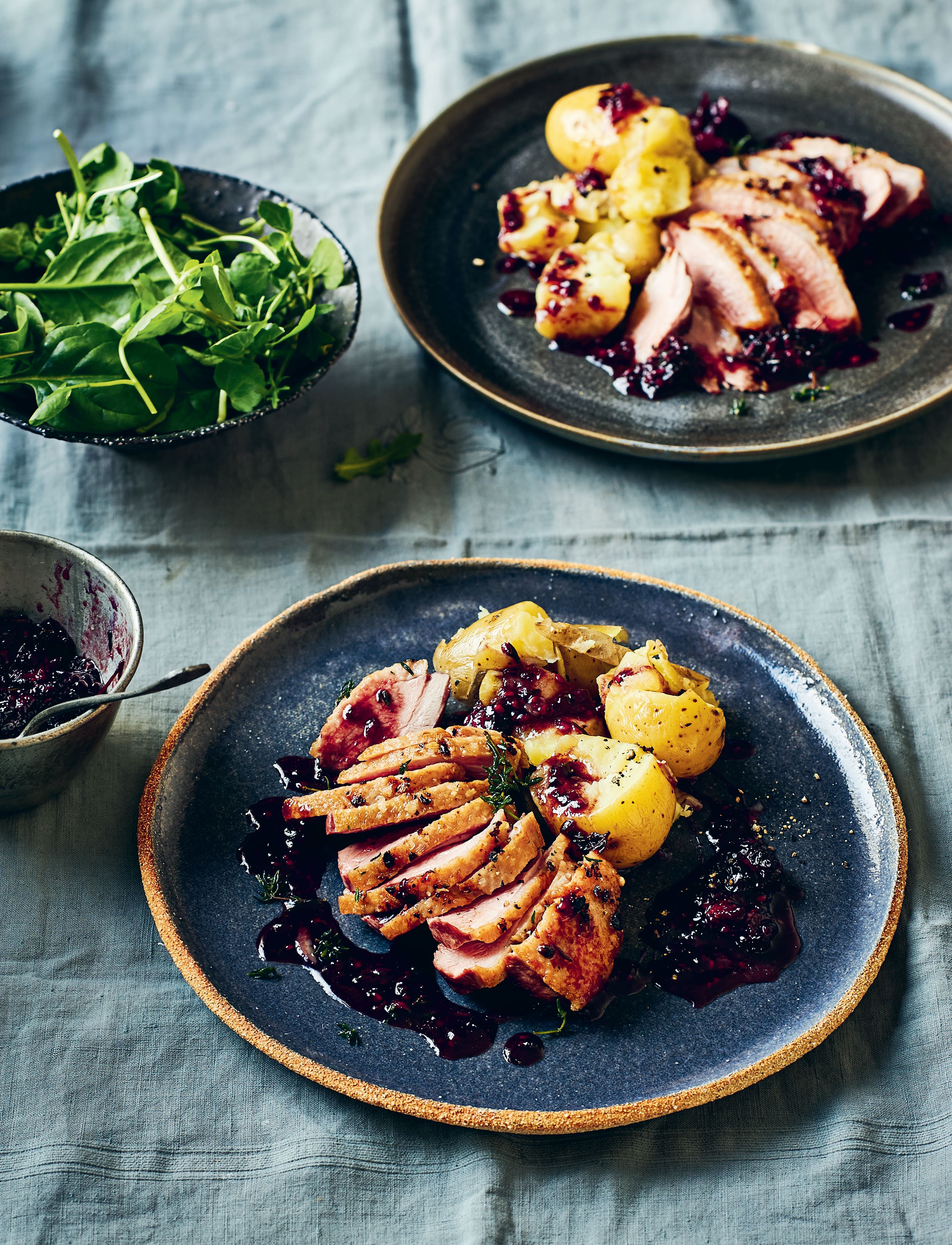 Duck breasts with juniper, blackberry and port sauce