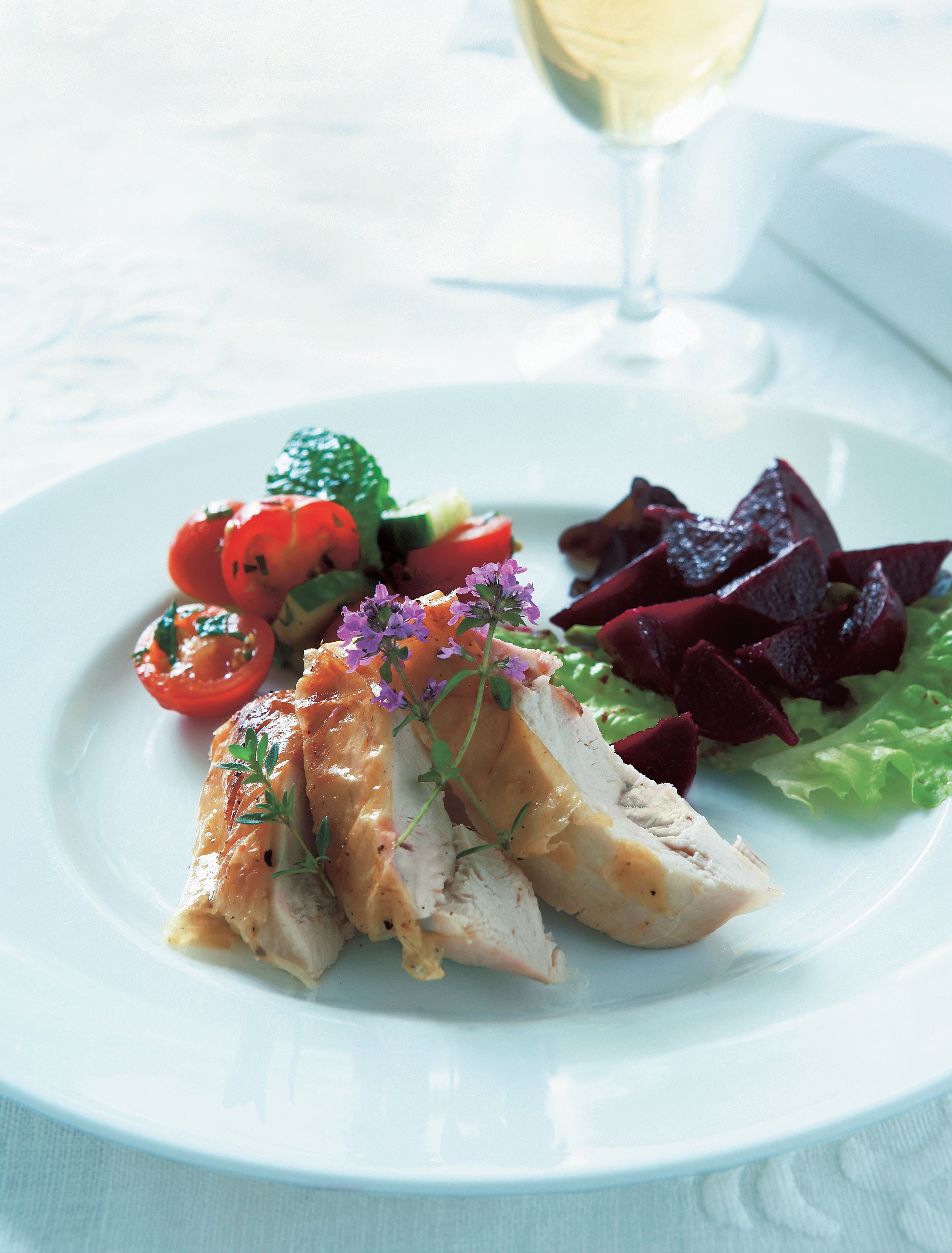 Lightly salted chicken with tomato-mint salad and beetroot salad