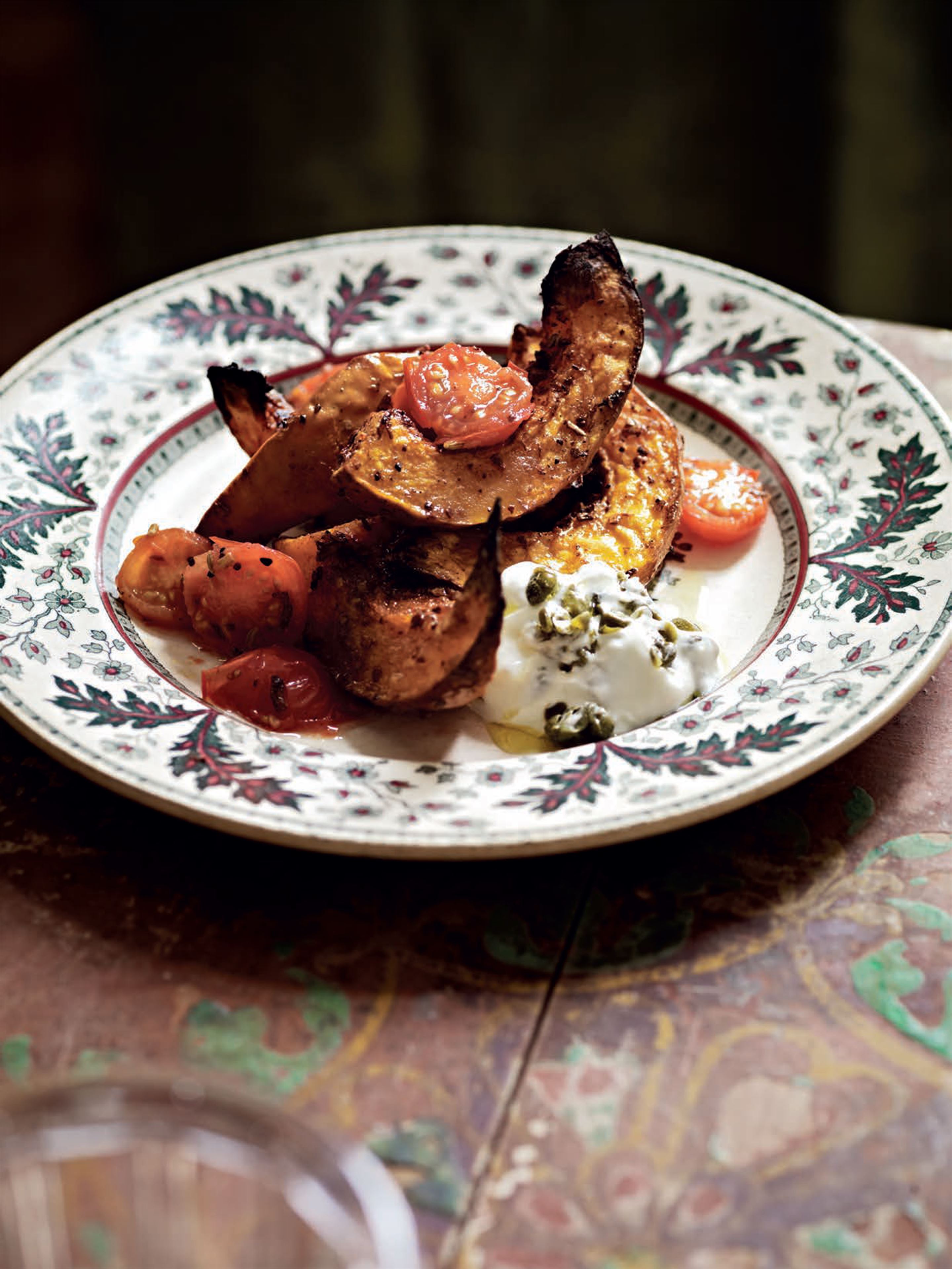 Spice-roasted butternut squash with tomatoes and capered yogurt