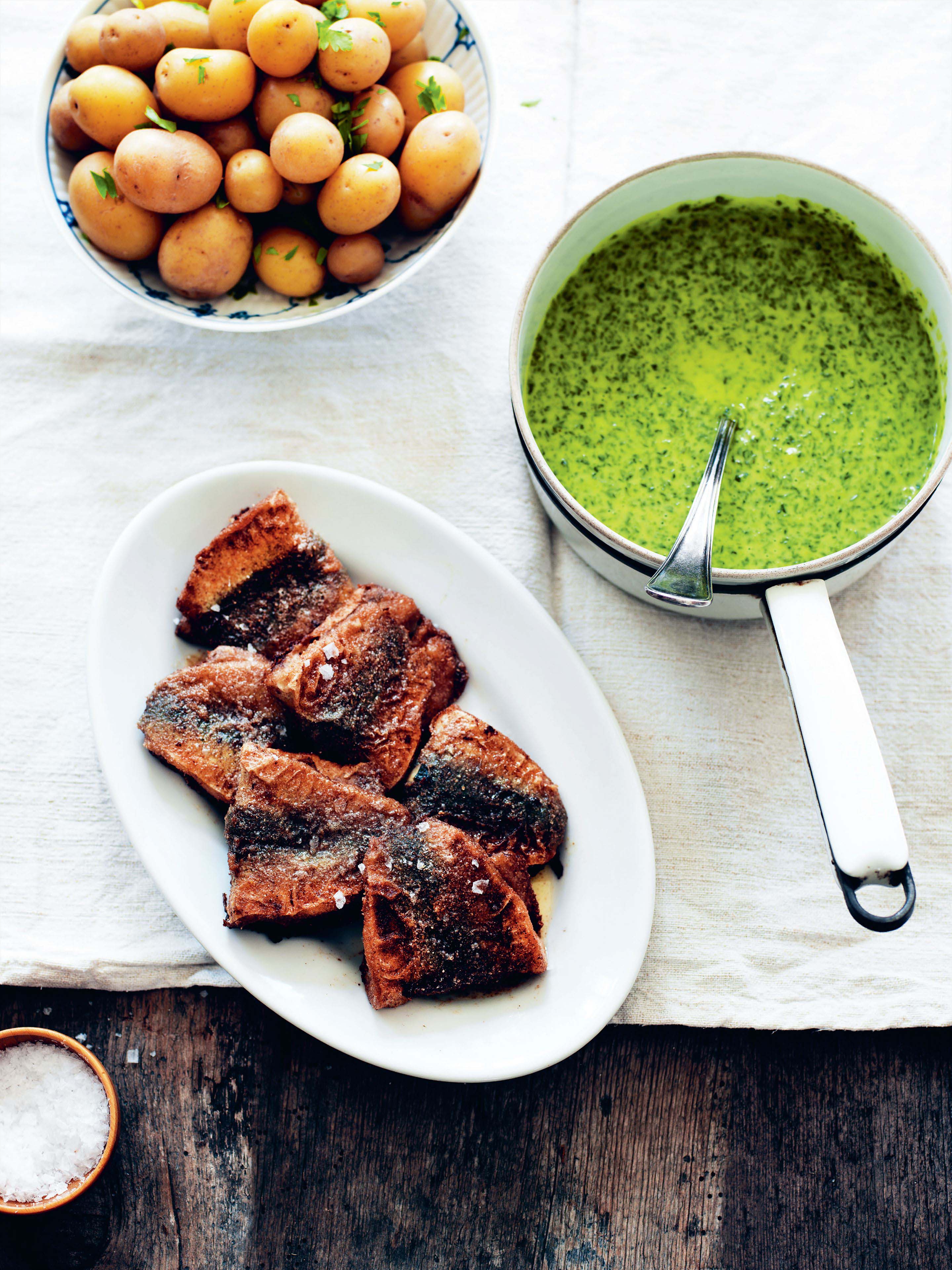 Pan-fried herrings with new potatoes and parsley sauce