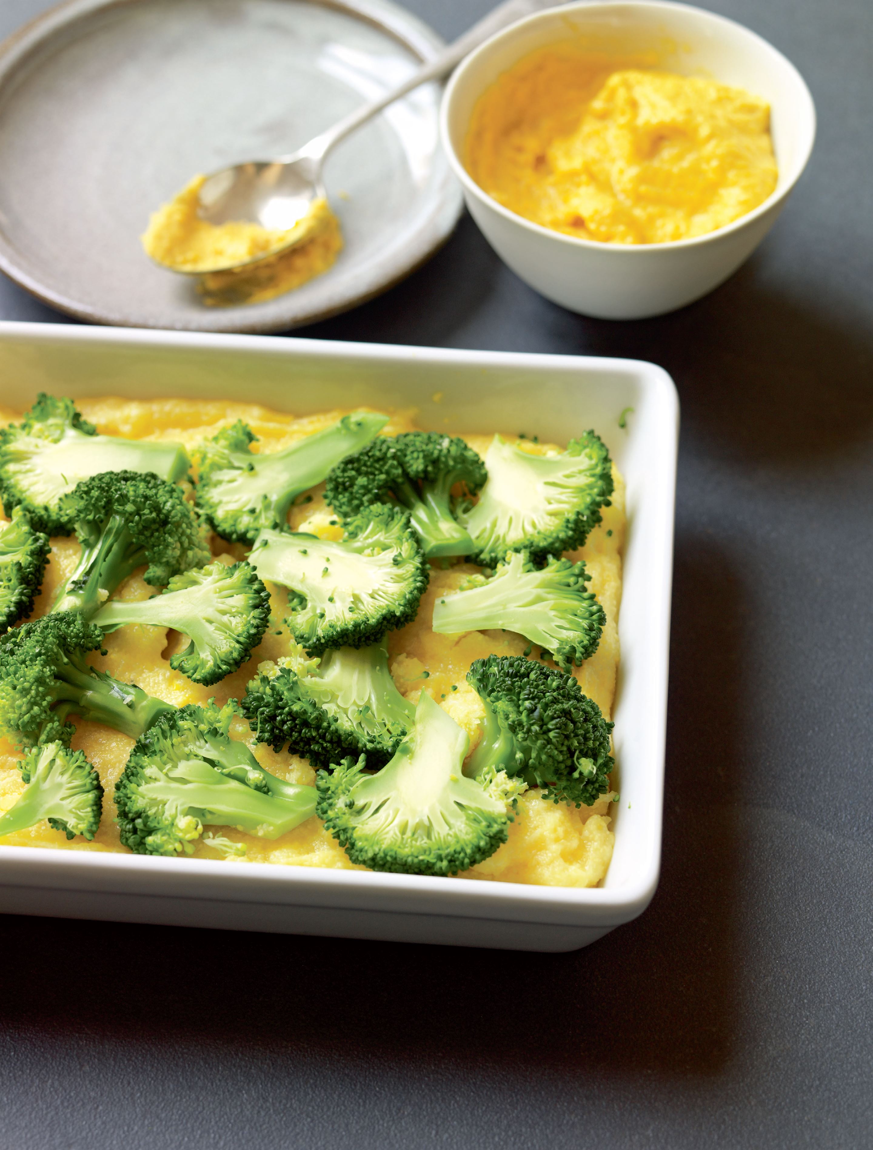Polenta and broccoli slice with a creamy pumpkin topping