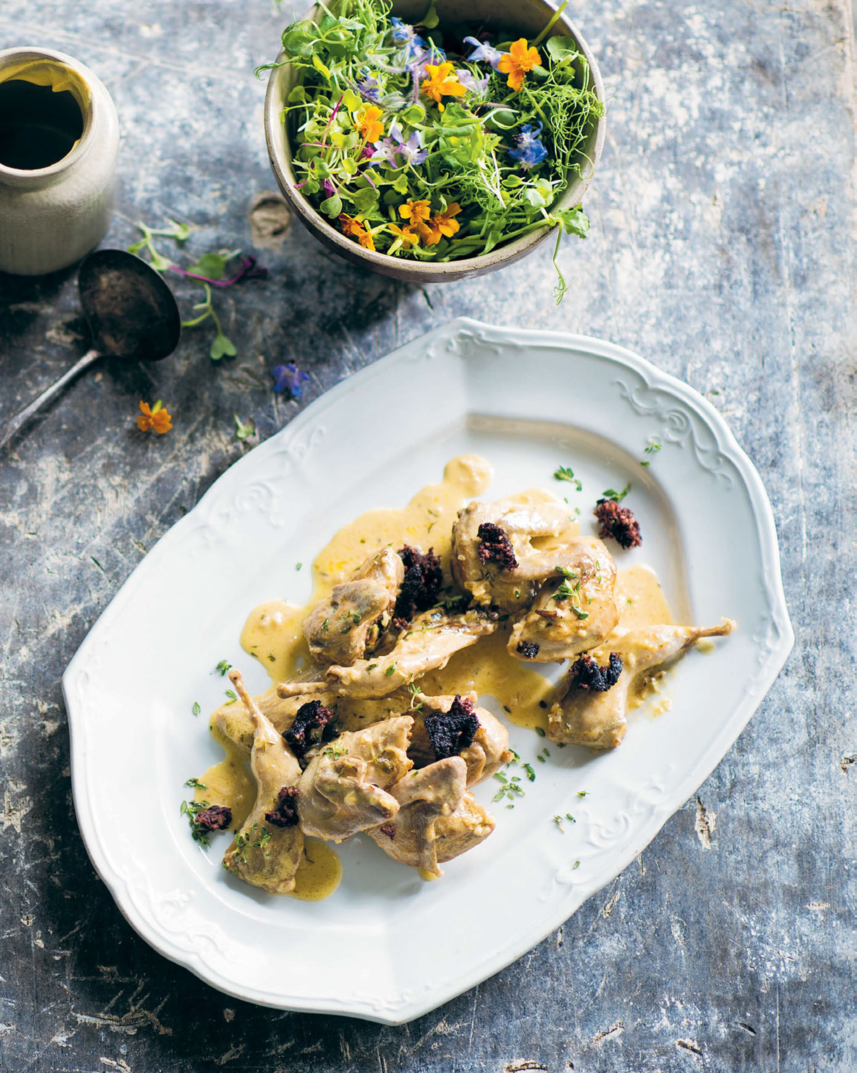 Pan-seared quail with black pudding & dijon sauce