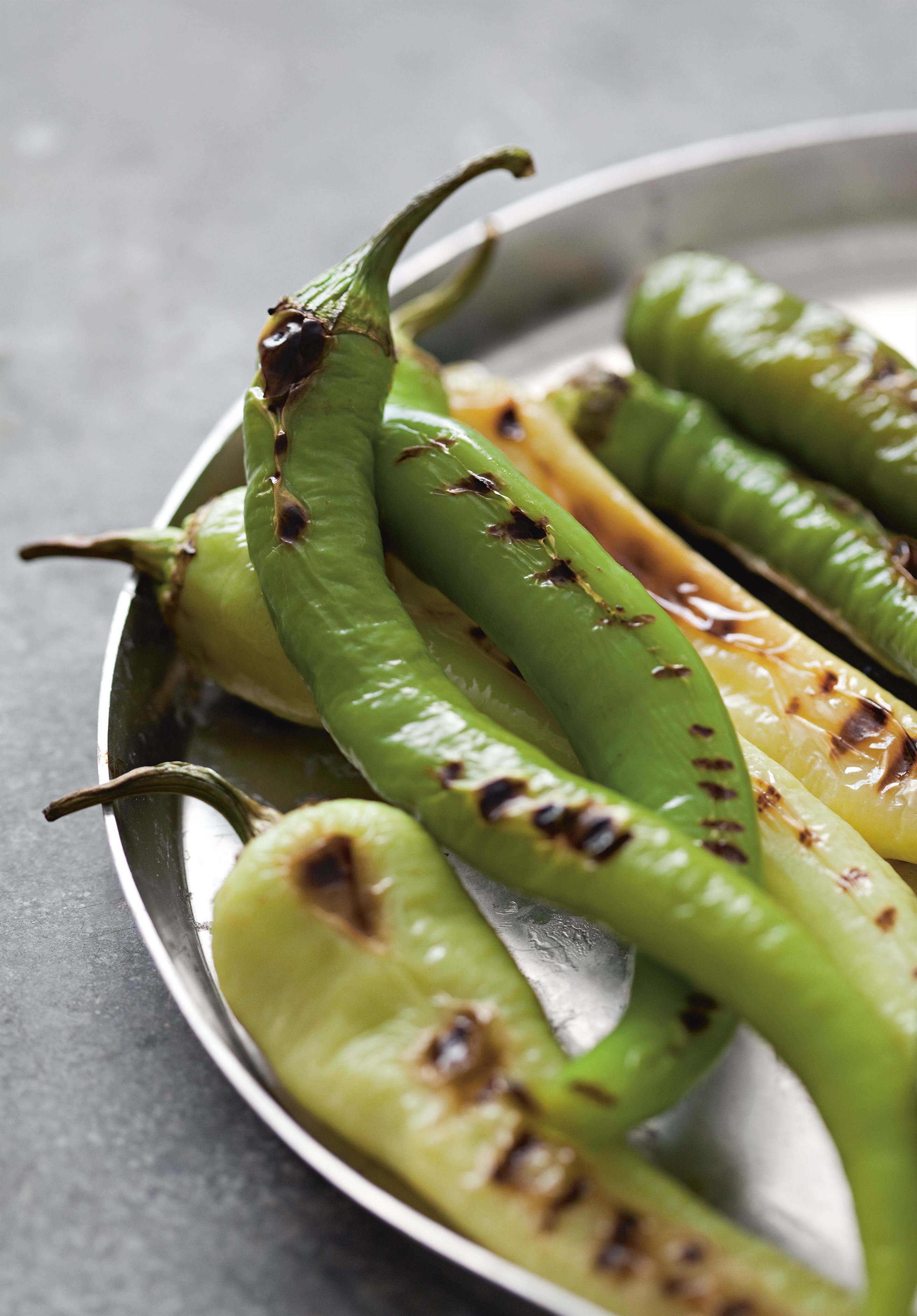 Grilled long green capsicums