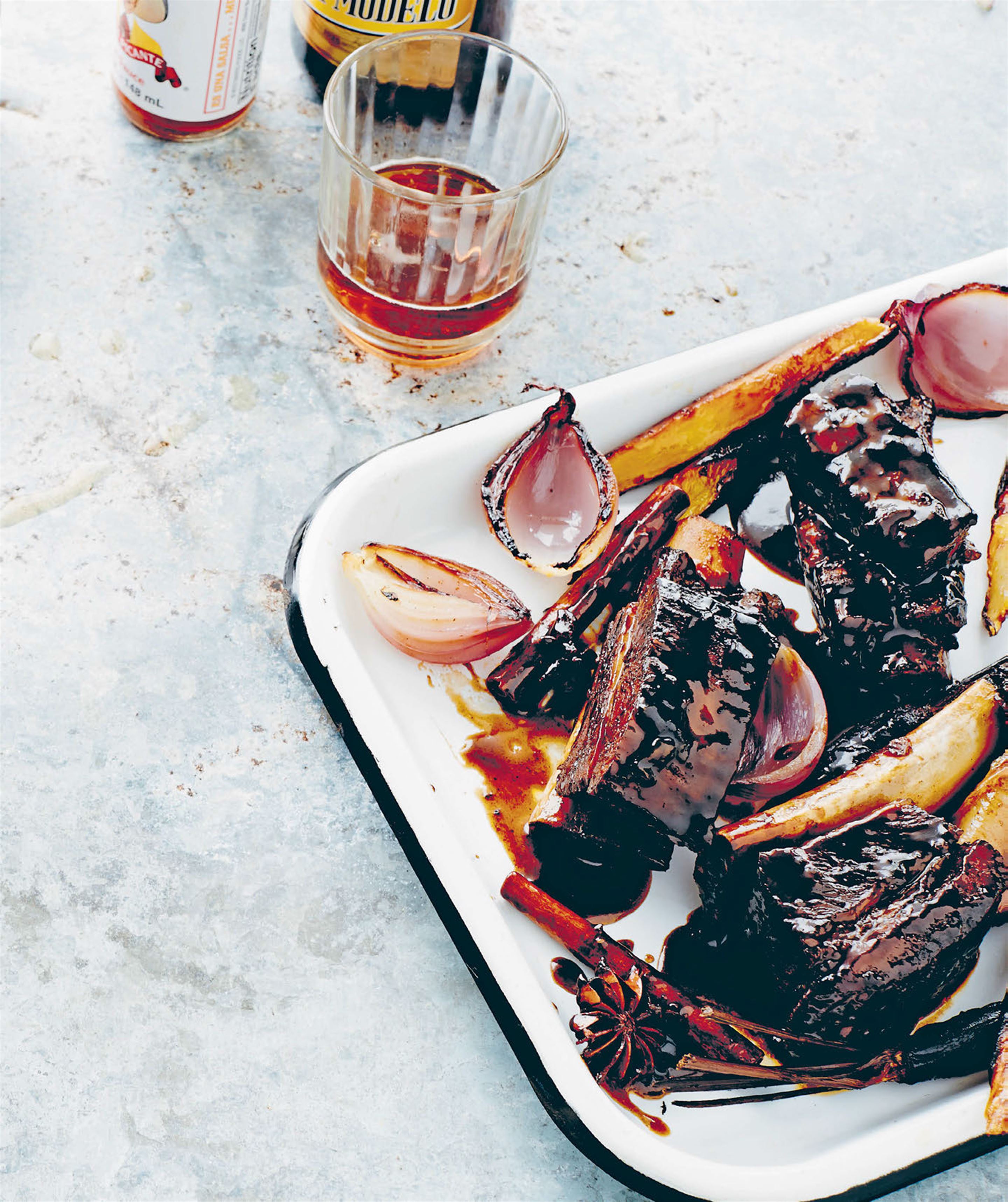 Low & slow beef short ribs with cerveza-caramelised onions & ancient grain salad