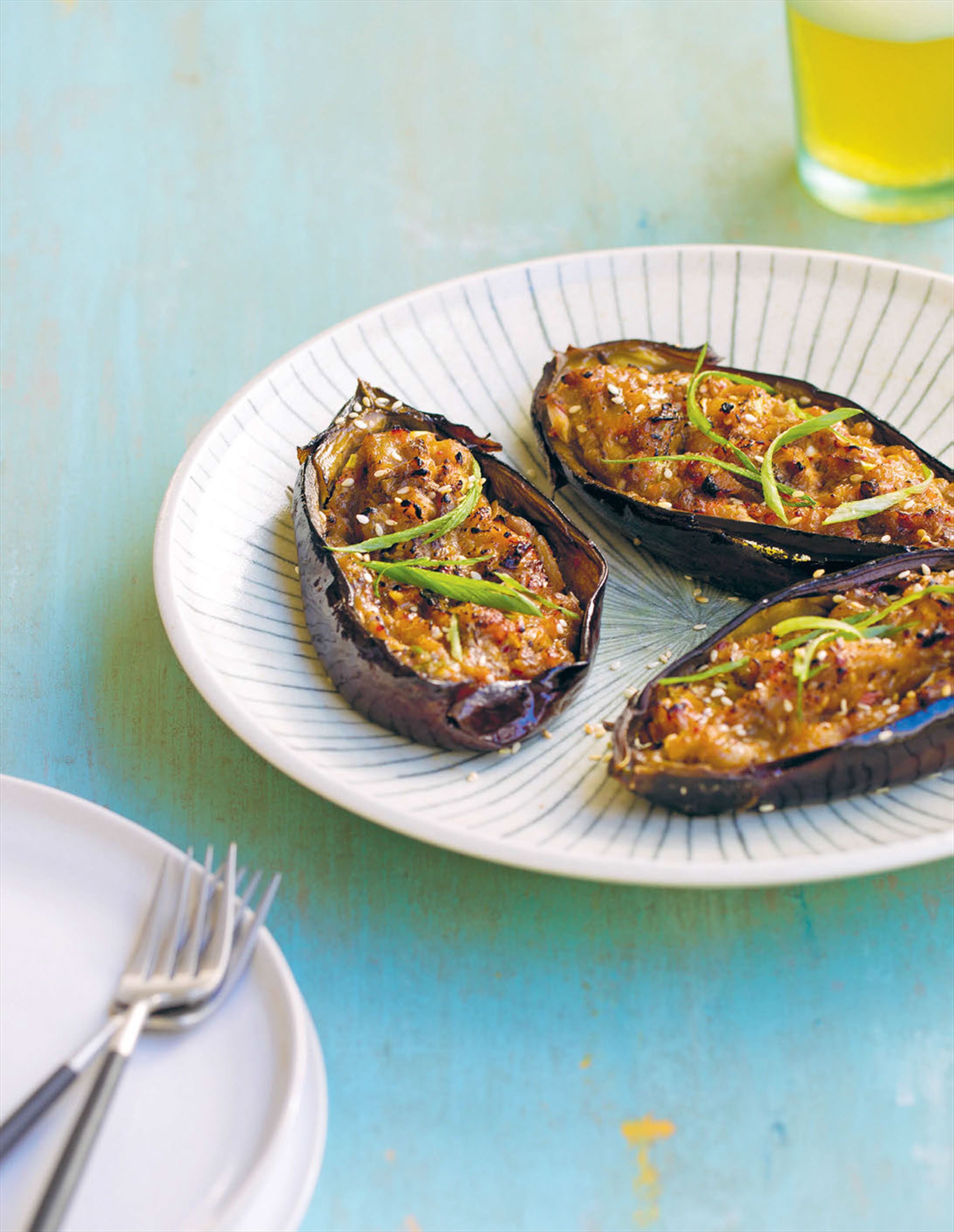 Miso-glazed eggplant with pickled ginger and spring onion