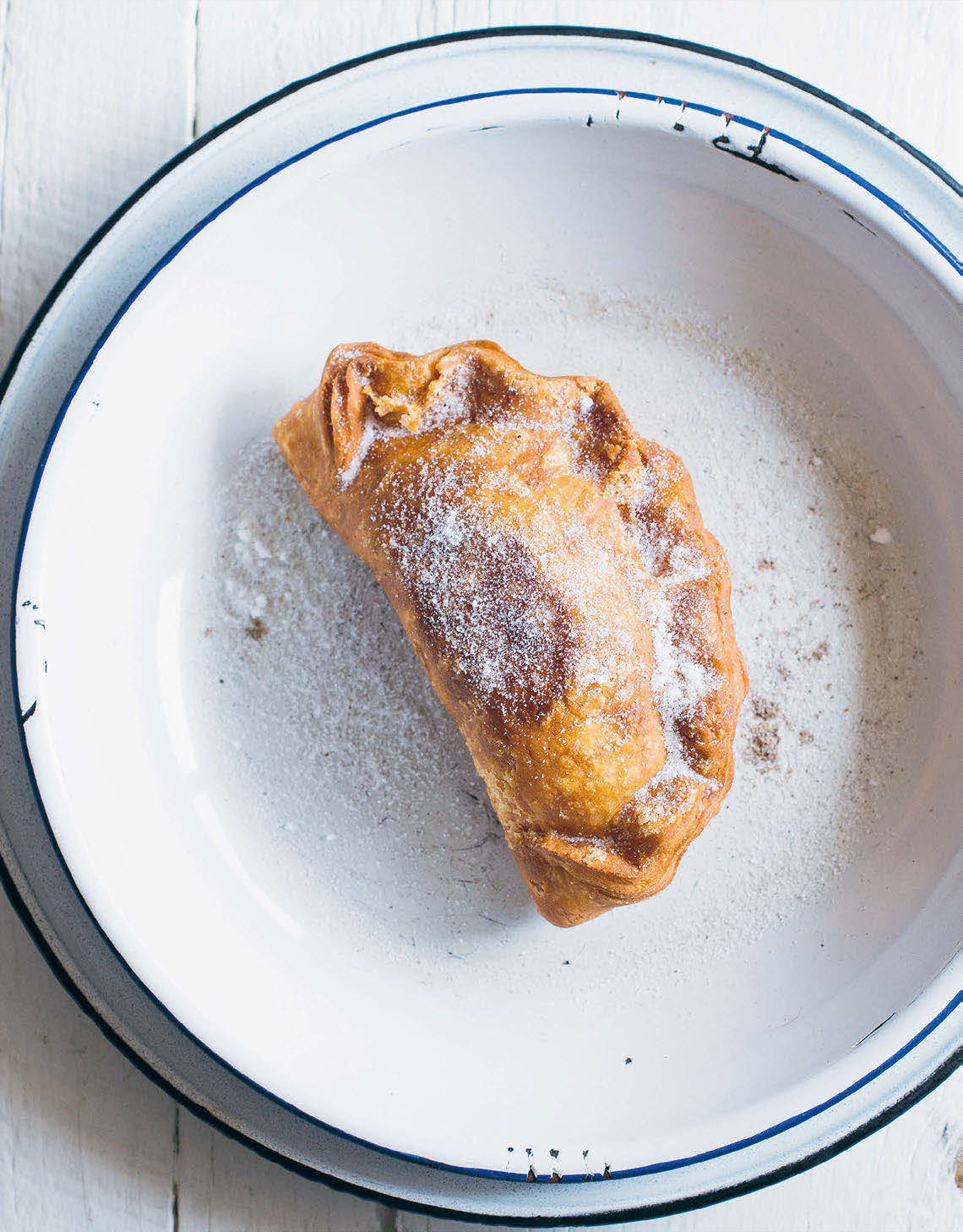 Fried apricot and cardamom sugar handpies