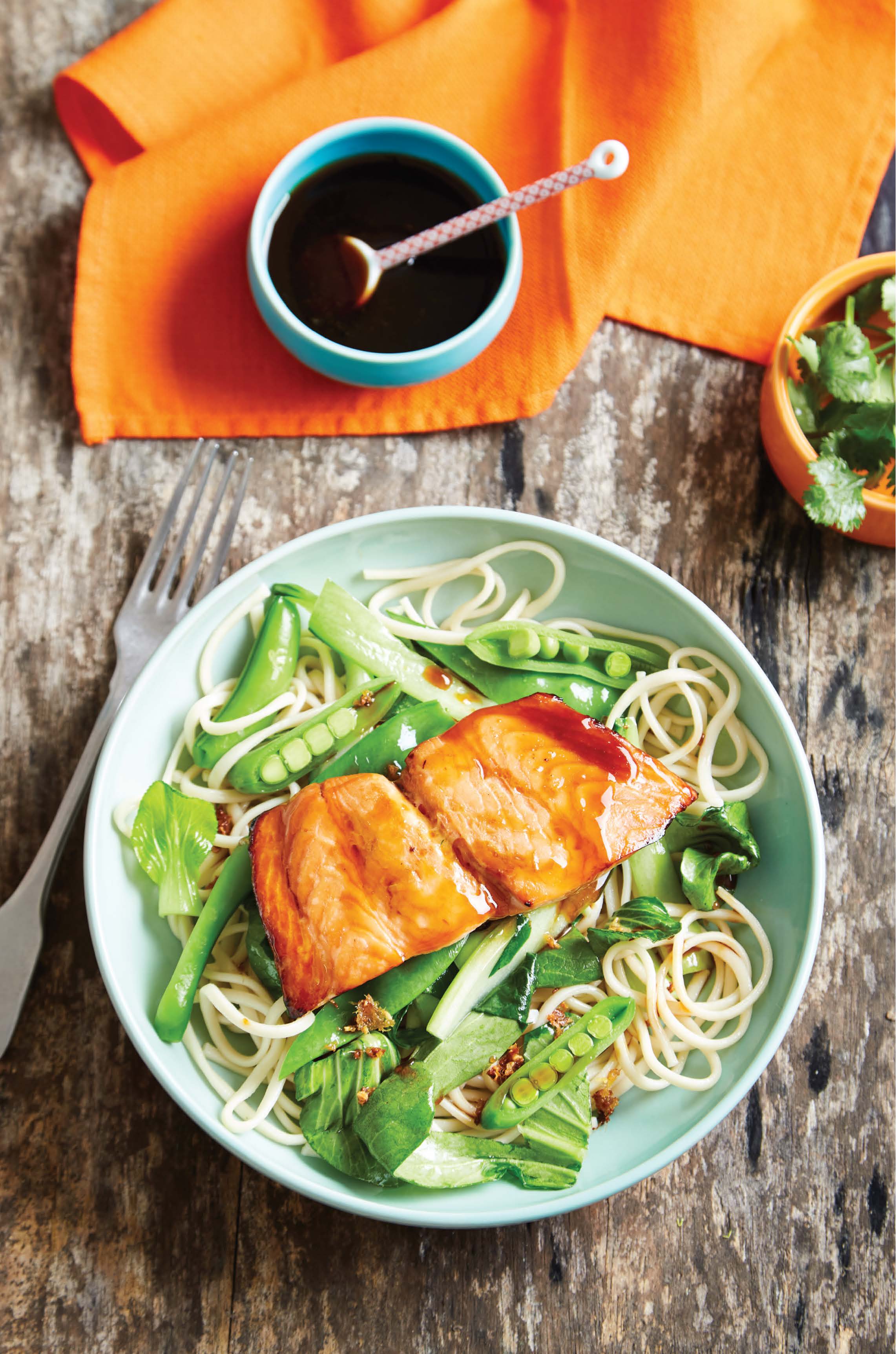 Teriyaki salmon with udon noodles and stir‑fried vegetables