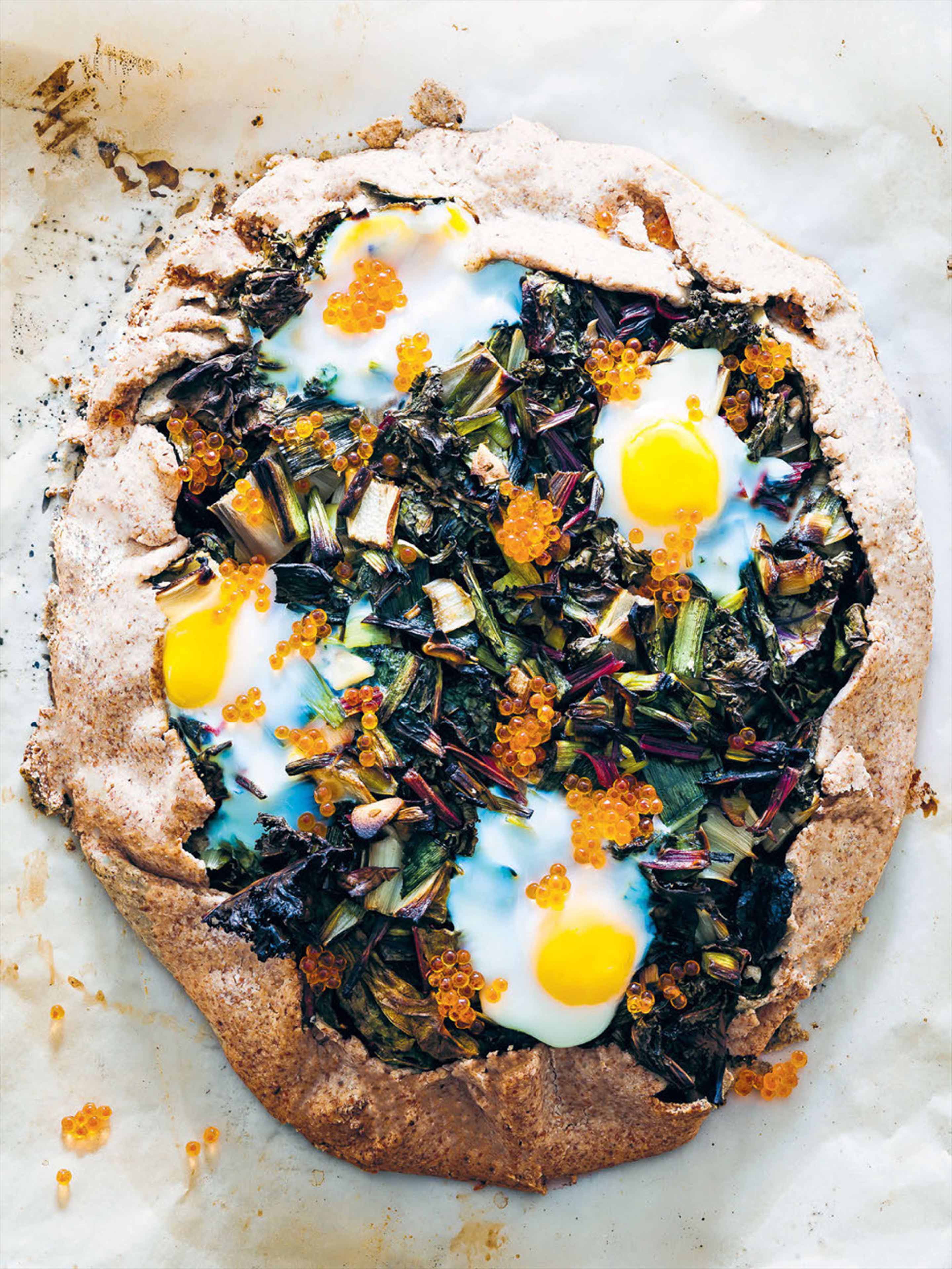 Rye tart with chard, roe & sunny-side eggs