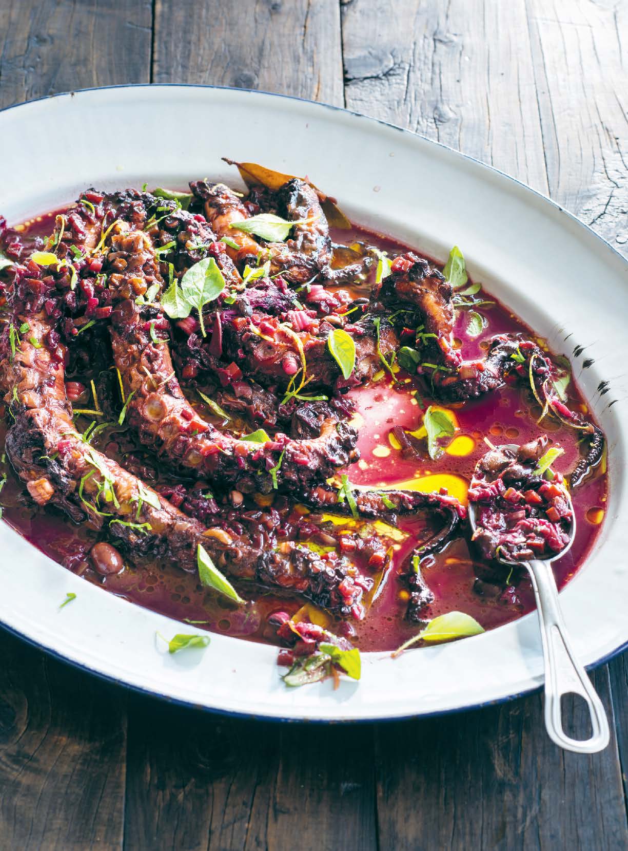 Octopus braised in red wine with lemon and oregano