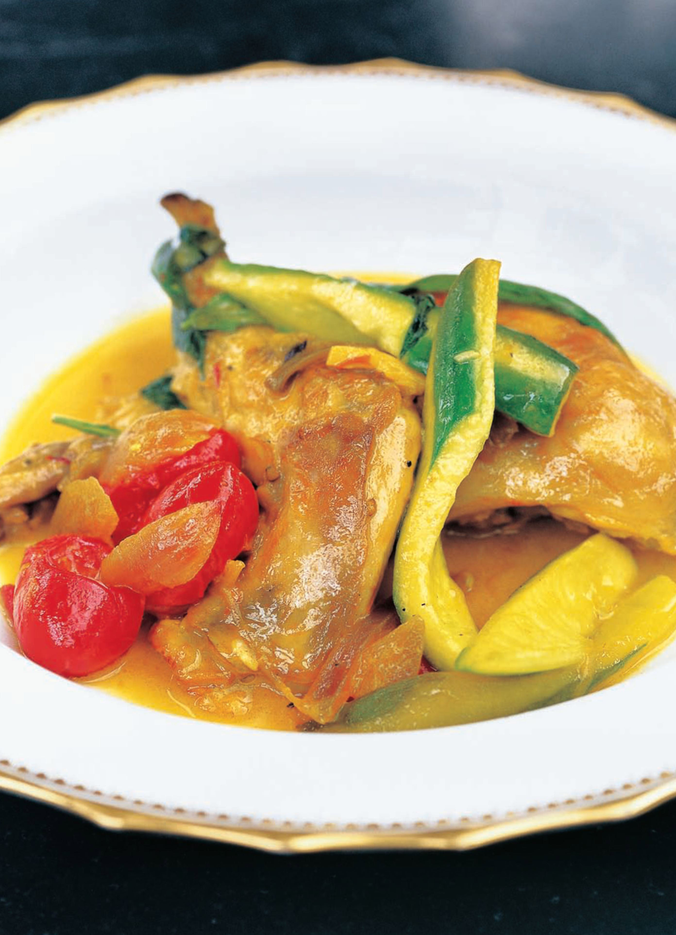 Rabbit with saffron, cucumber, tomatoes and basil