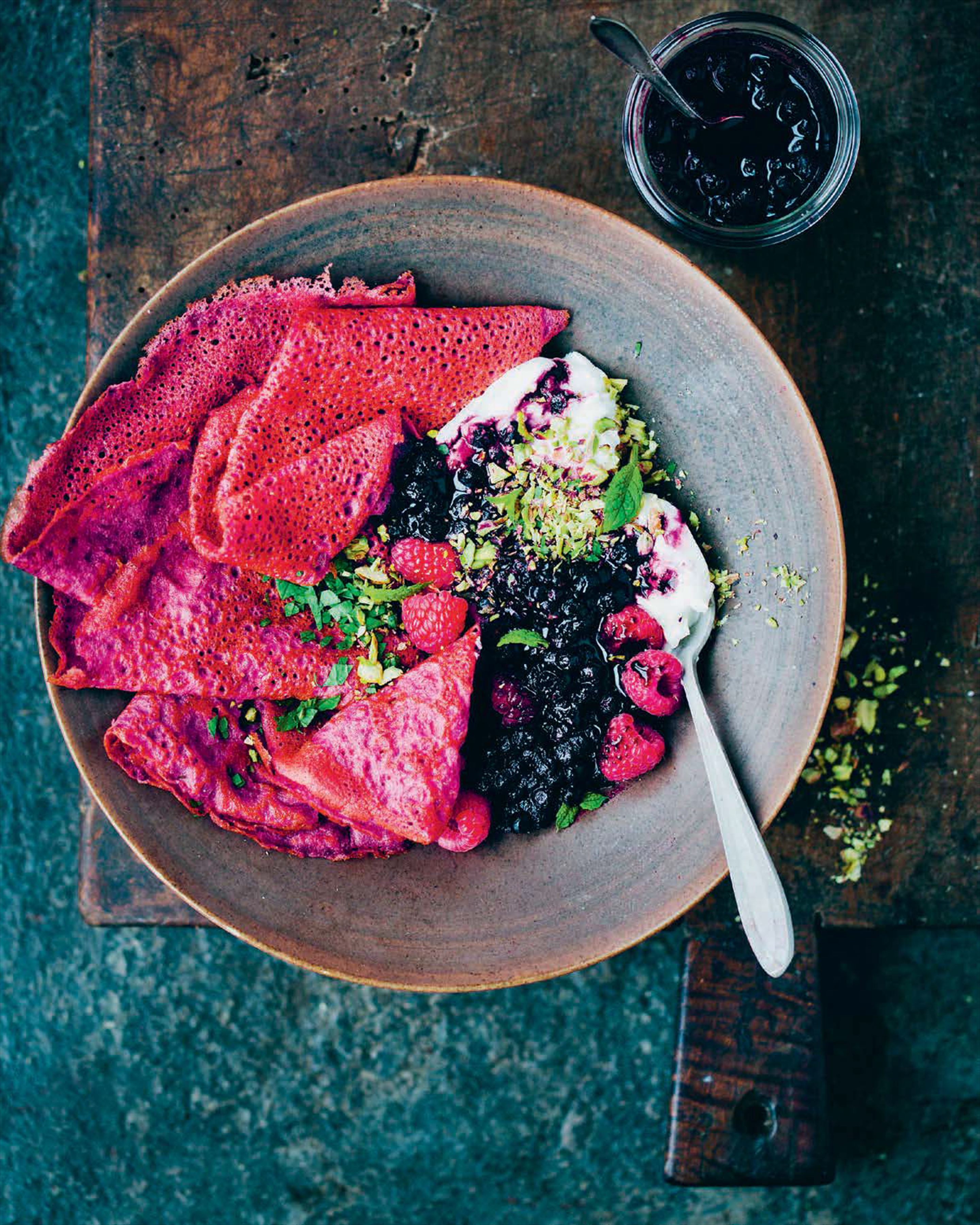 Beetroot crepes with warm blueberry compote and yoghurt
