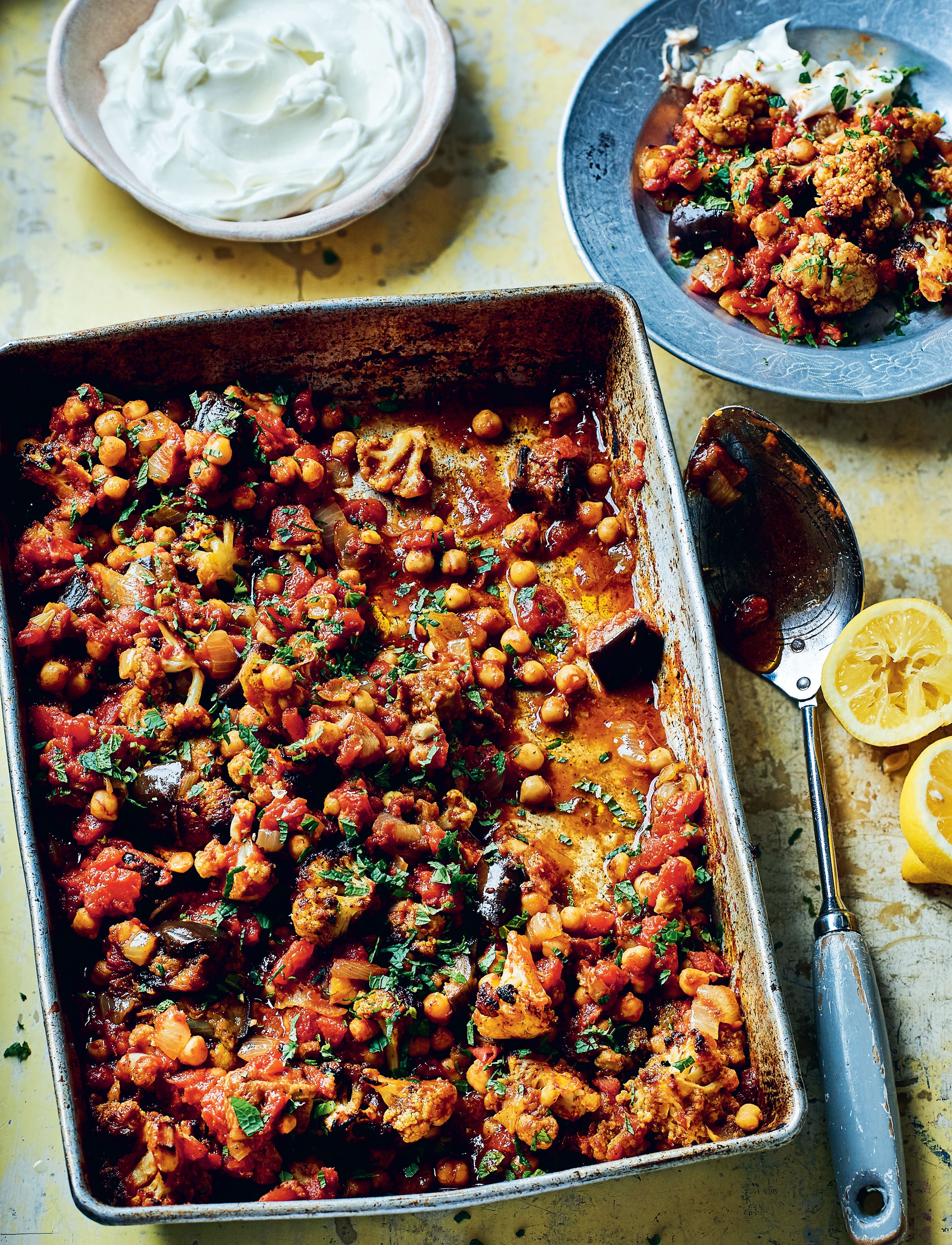 Spiced vegetables and chickpeas with yoghurt and mint