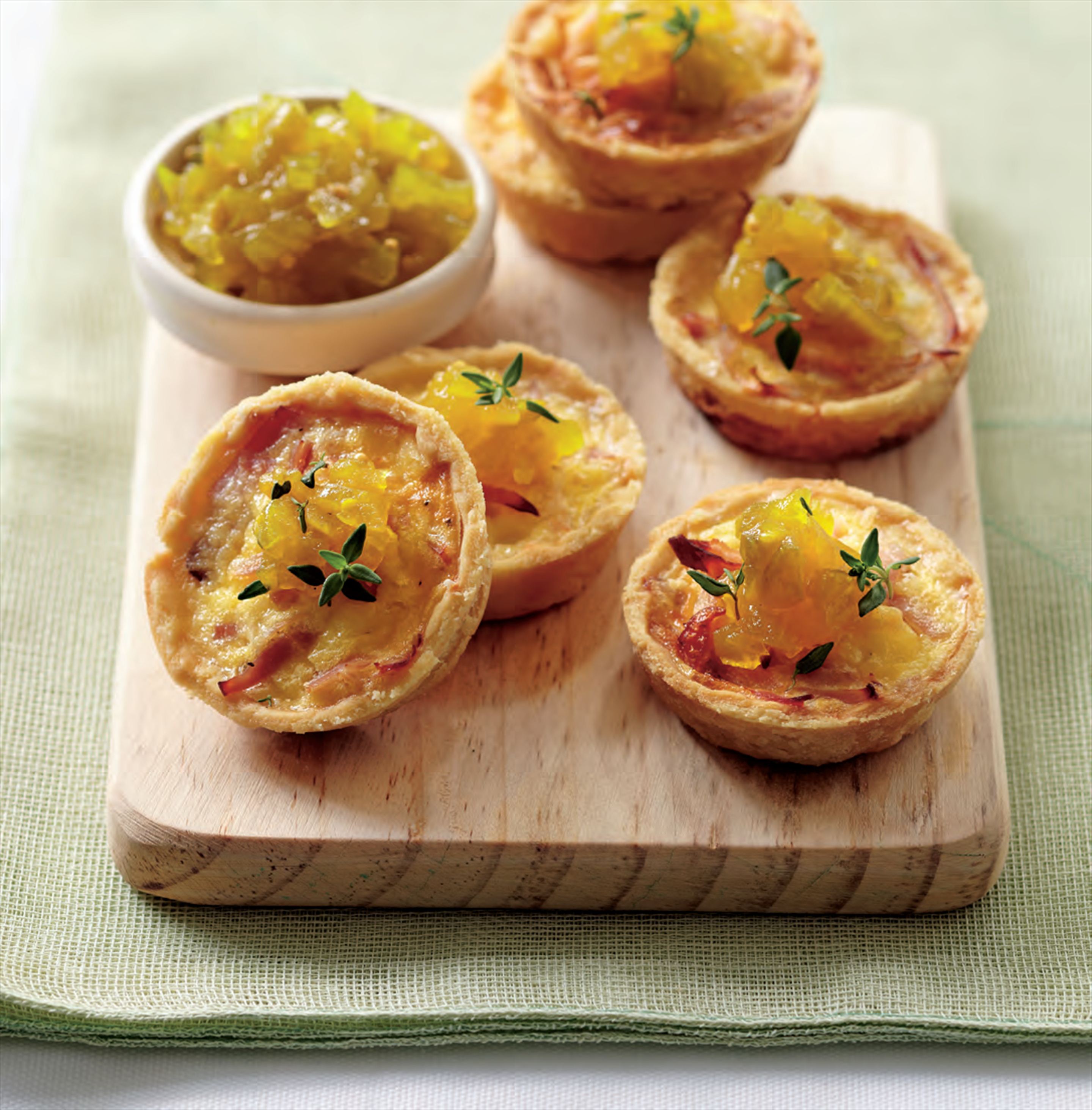 Smoked ham and cheddar quichettes with green tomato pickle