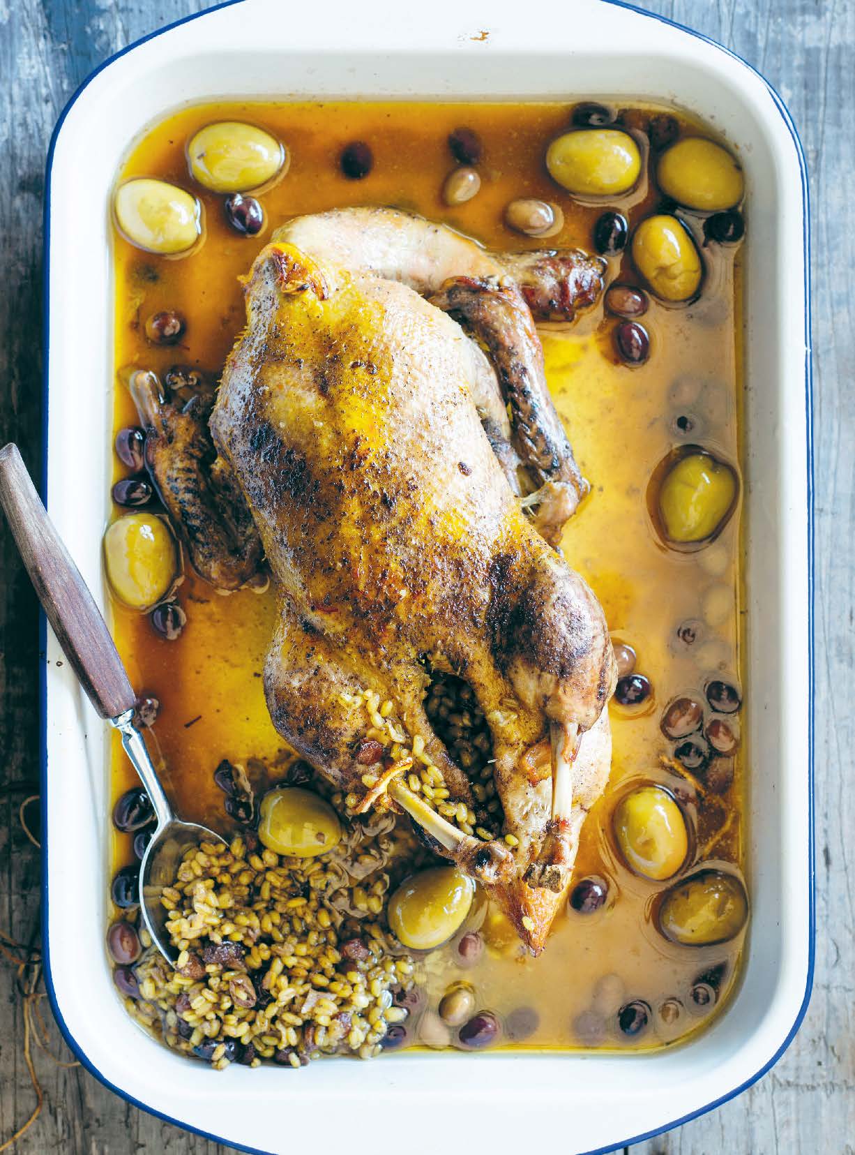 Freekeh-stuffed duck with saffron, olives and preserved lemon