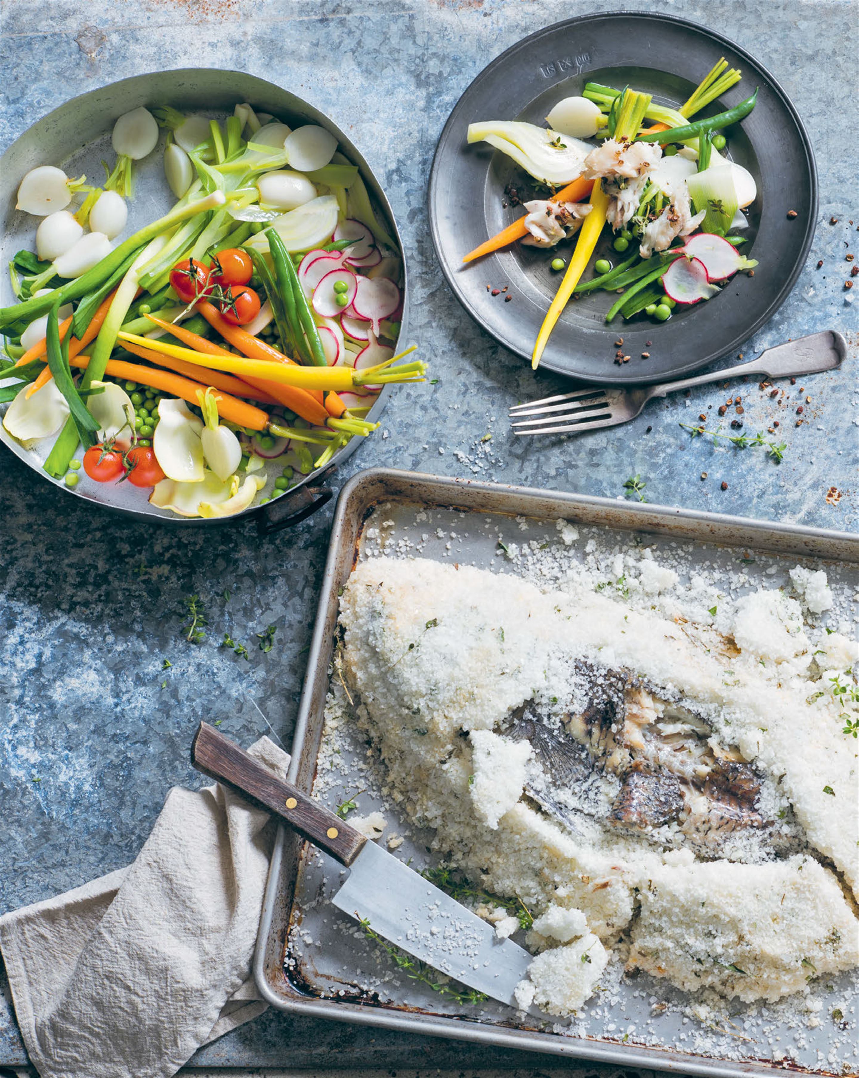 Salt-crusted fish with spring vegetables