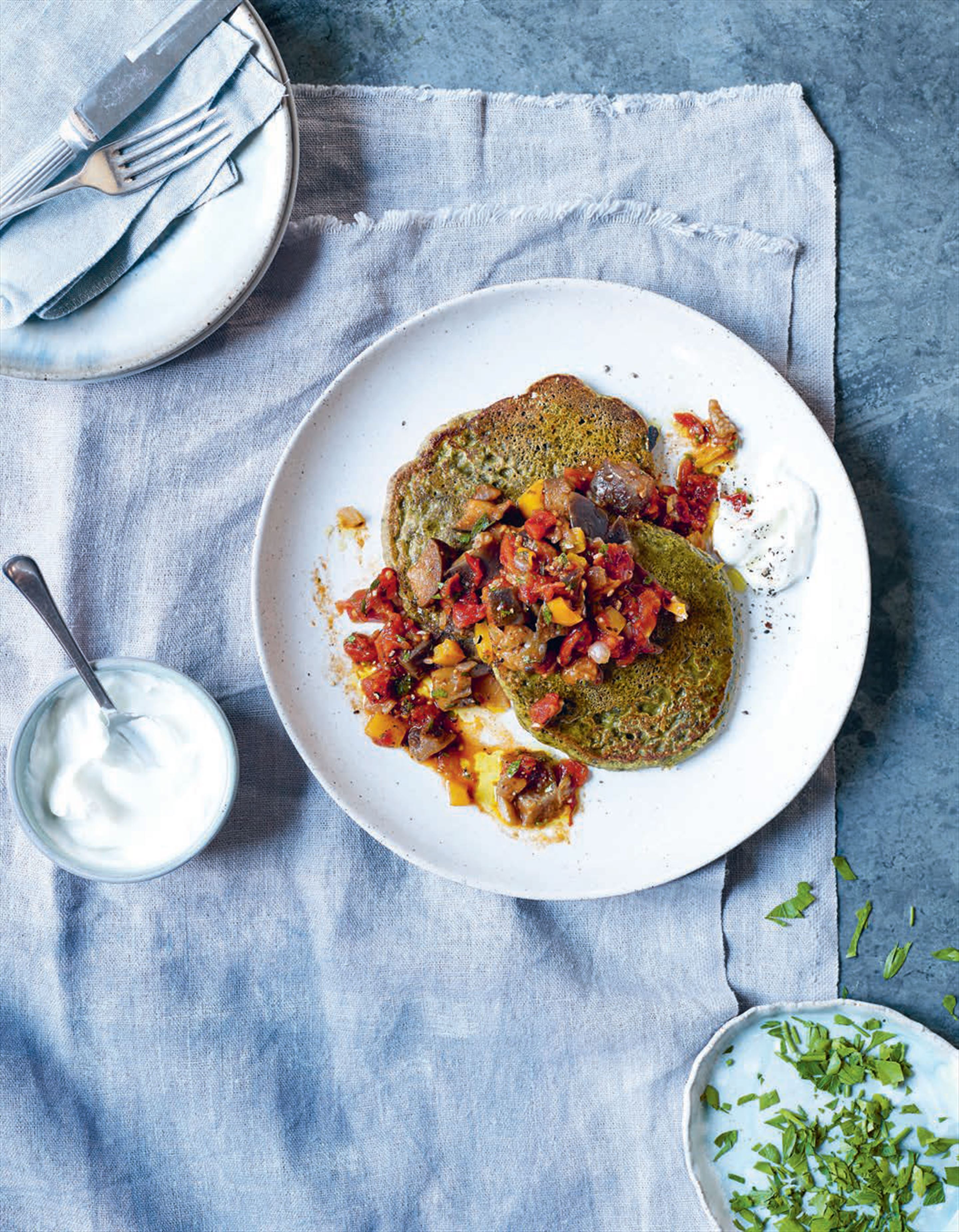 Chickpea and chard pancakes with aubergine stew